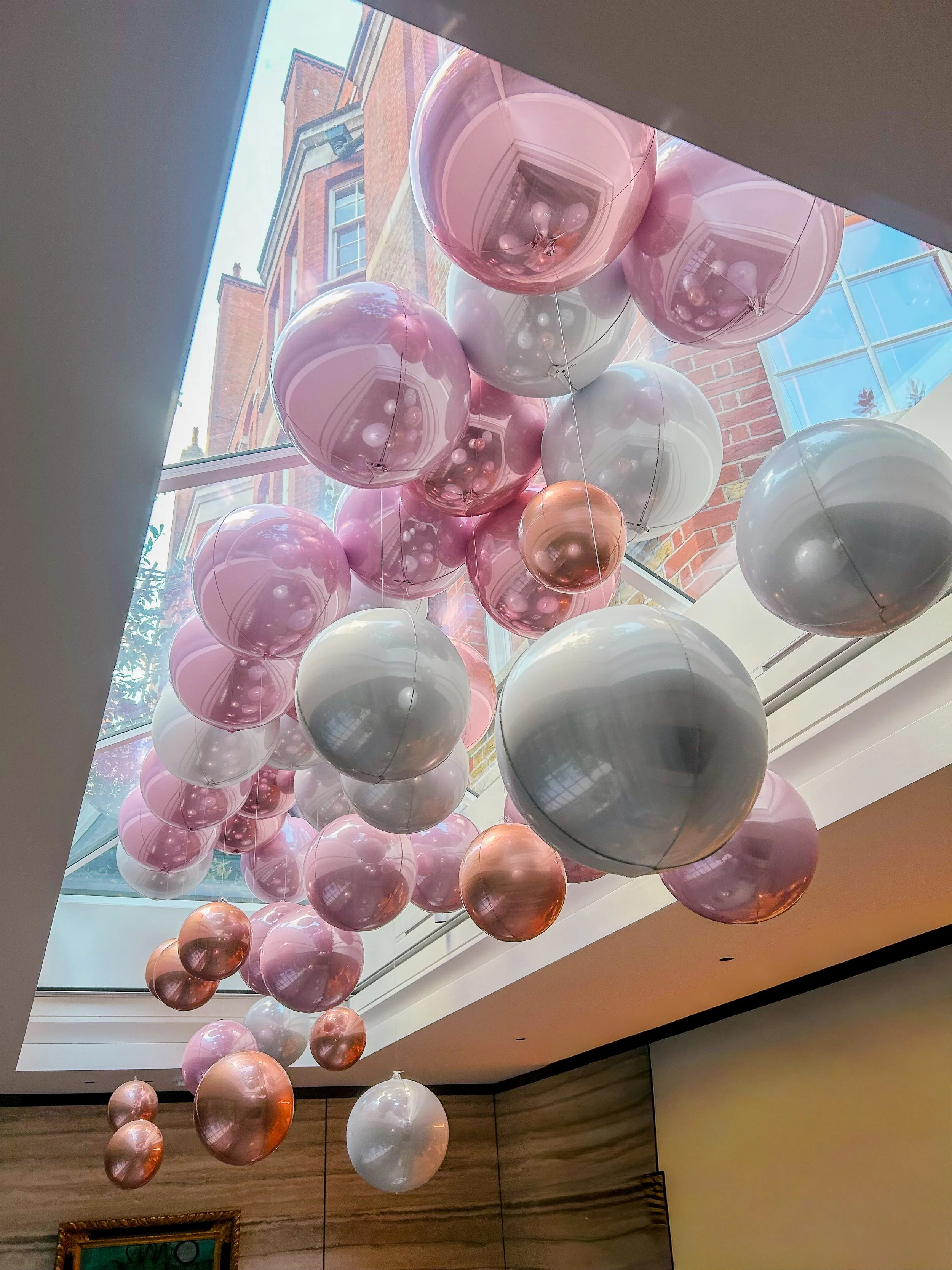Leyla's Birthday - Rose gold / pink bows ribbon ceiling installation