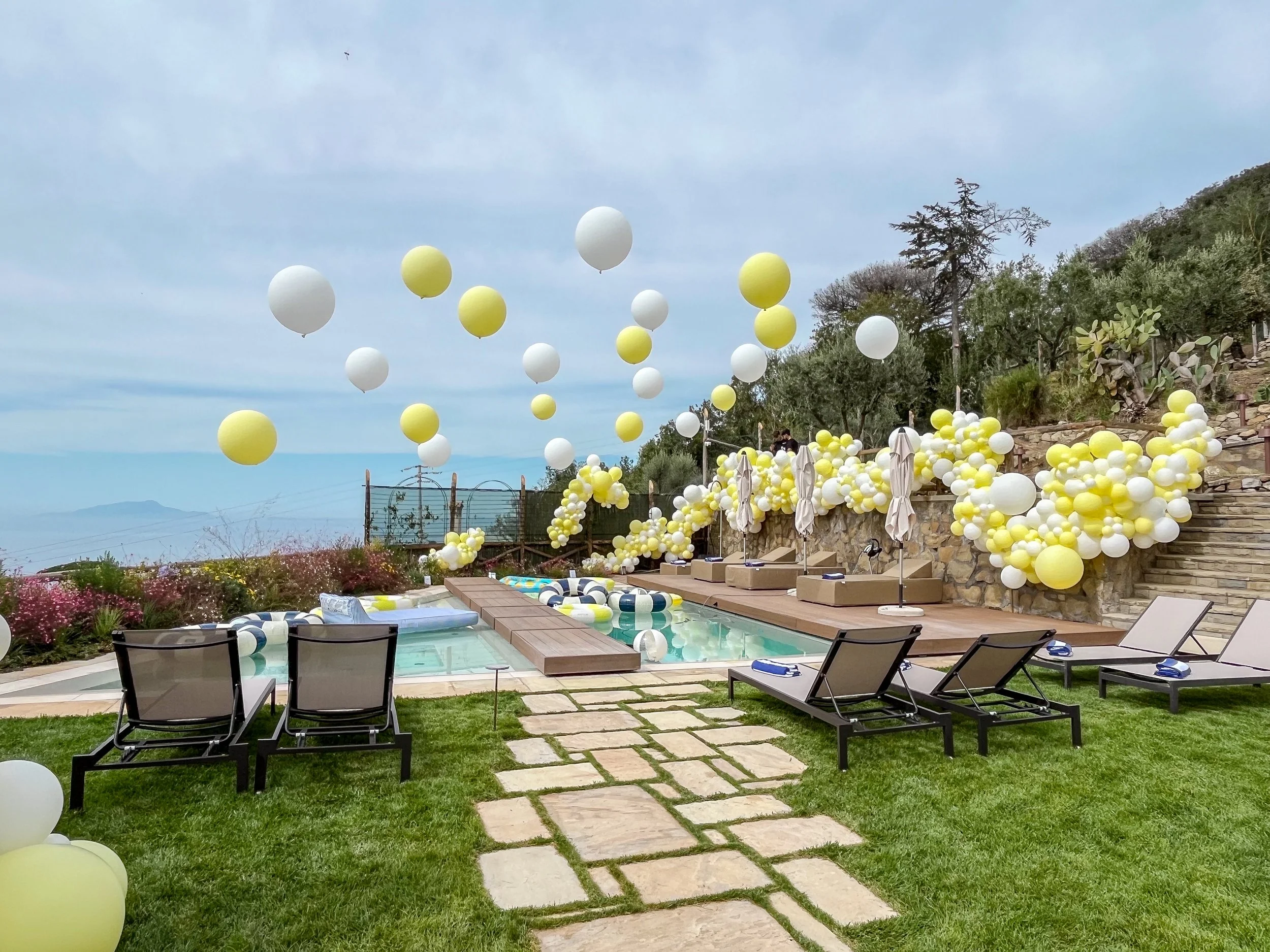 Italy Wedding After Party - Lemon yellow pool suspended