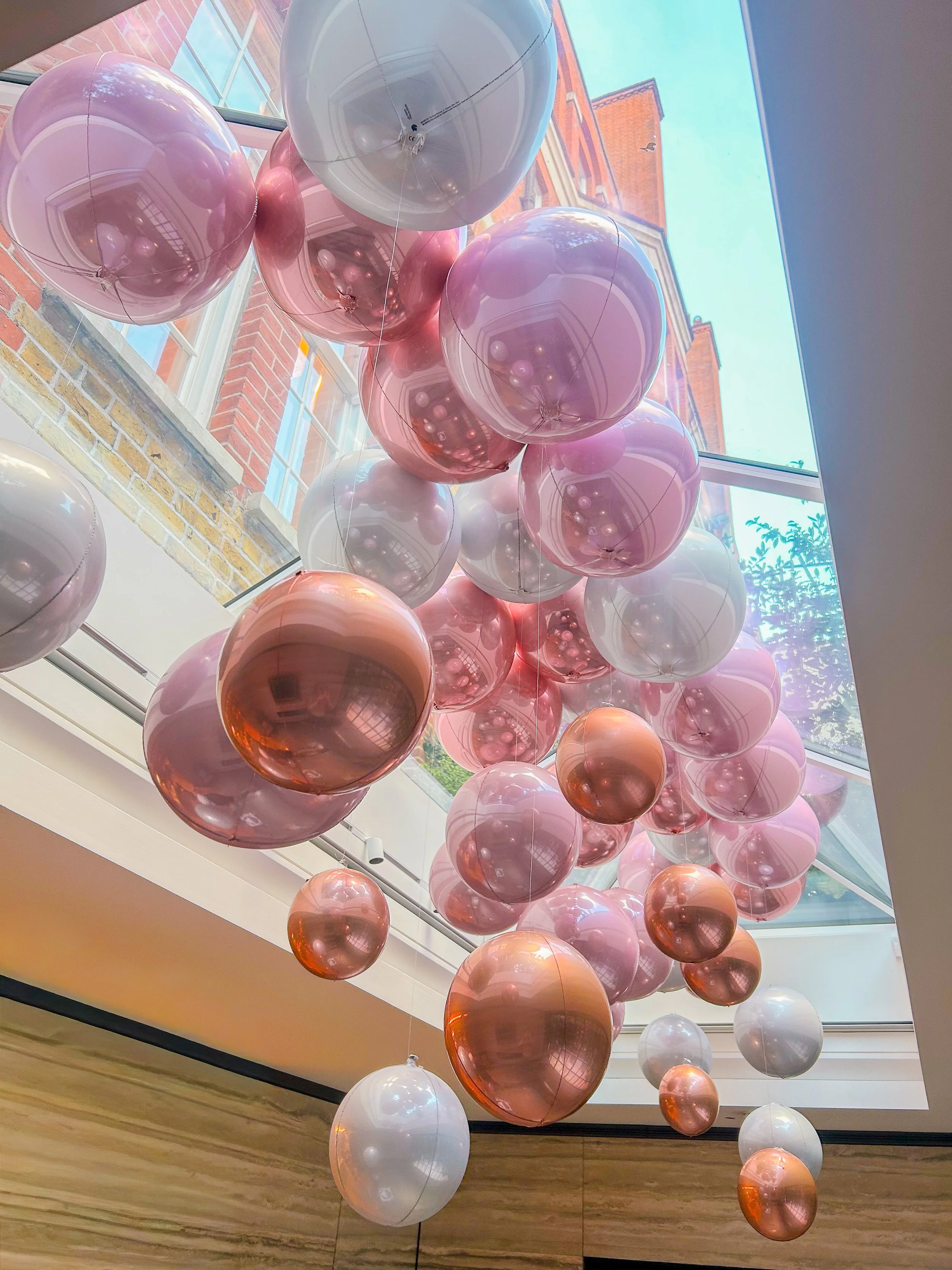 Leyla's Birthday - Rose gold / pink bows ribbon ceiling installation