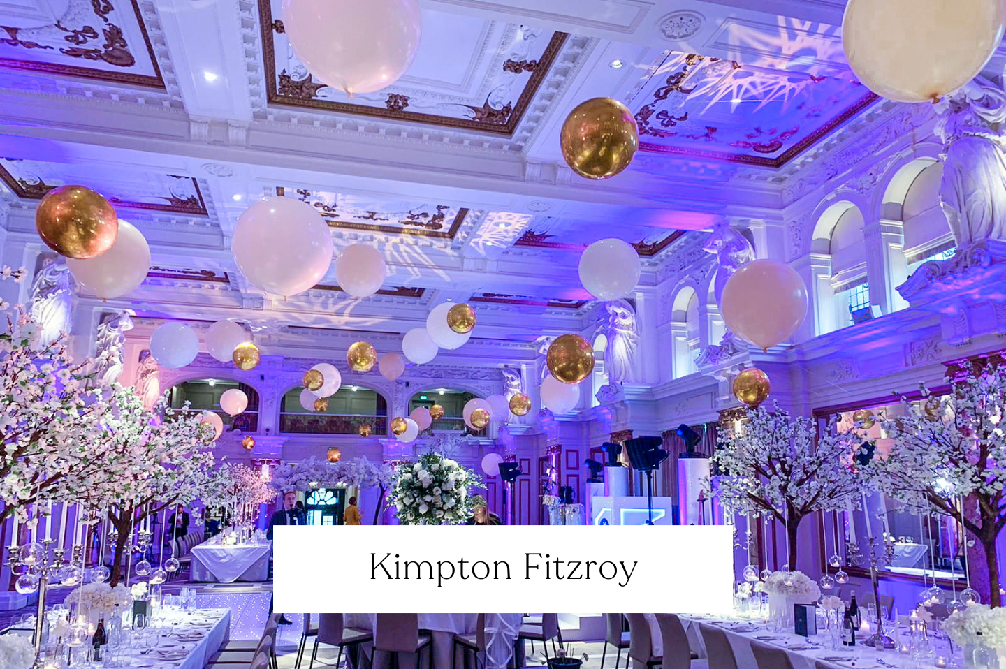 Kimpton Fitzroy, London, Decorated with giant balloons suspended from the ceiling in golds, white and confetti giant balloons. 