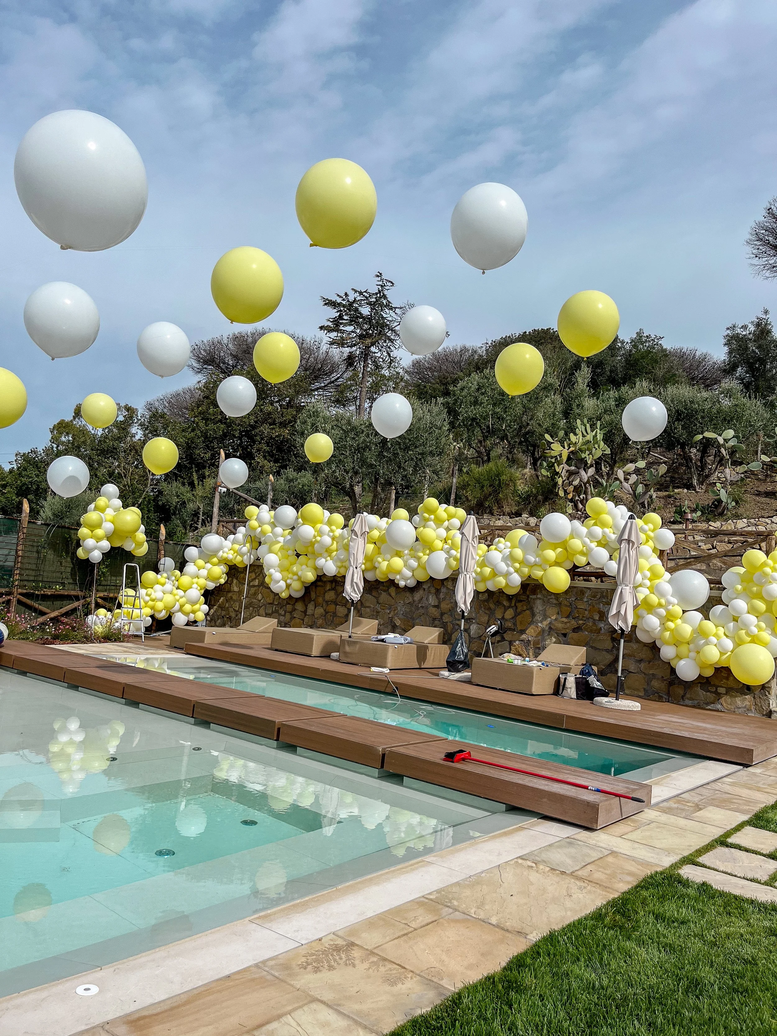 Italy Wedding After Party - Lemon yellow pool suspended
