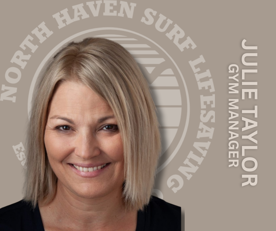 A woman with shoulder-length blonde hair smiling in front of a gray background with the North Haven Surf Life Saving logo and her name, Julie Taylor, Gym Manager, written on it.