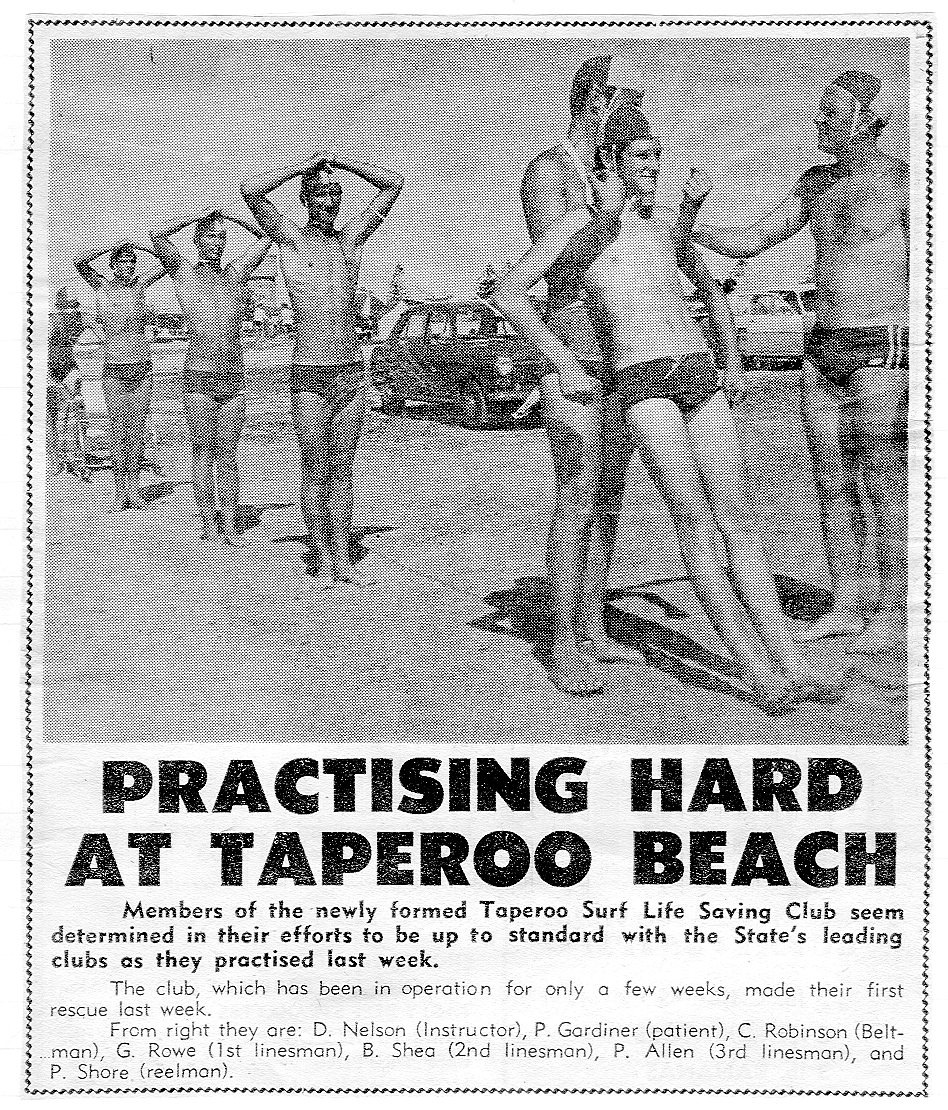 Black and white photo of a group of young women and men in swimsuits practicing on the beach, with cars parked in the background. The headline reads 'Practising Hard at Taperoo Beach.'