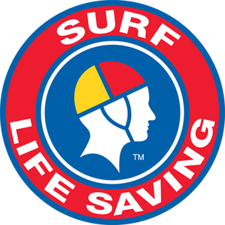 A circular logo for Surf Life Saving featuring a profile of a person wearing a yellow, red, and blue cap, with the words 'Surf Life Saving' around the circle.