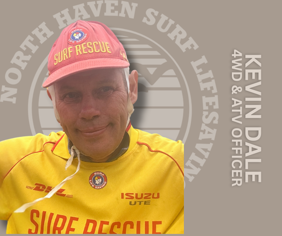 Kevin Dale, a 4W&AW official, wearing a pink surf rescue hat with a logo and a yellow surf rescue shirt with sponsor logos, smiling in front of a surf life saving background.