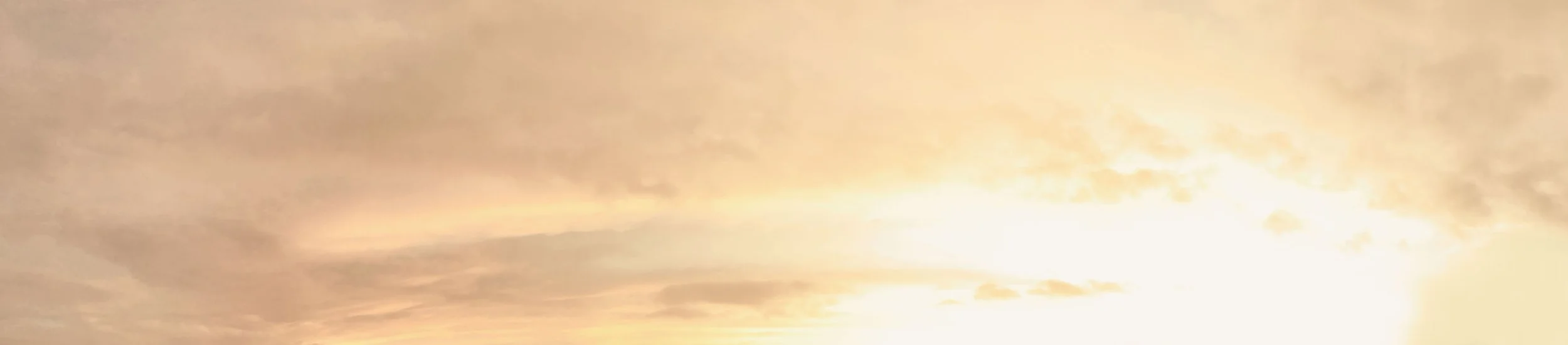 Sky with clouds during sunset or sunrise.