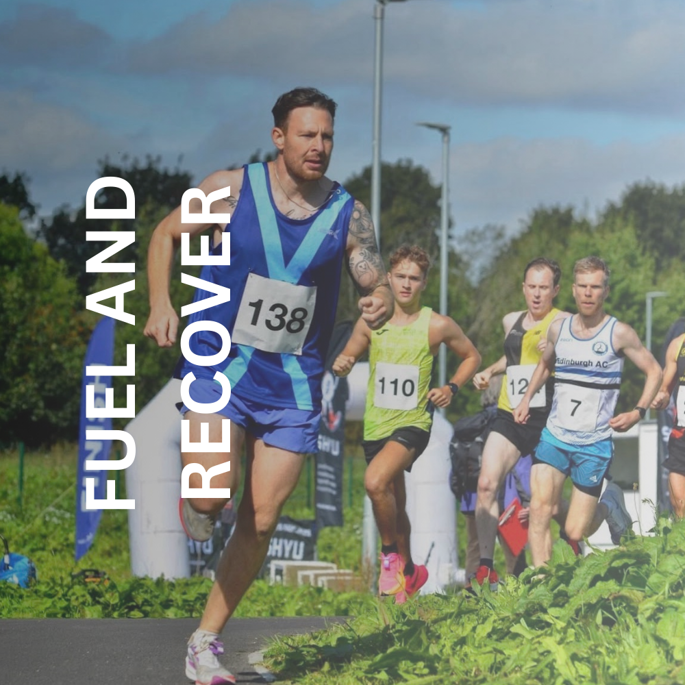 Greig running a race with other competitors 