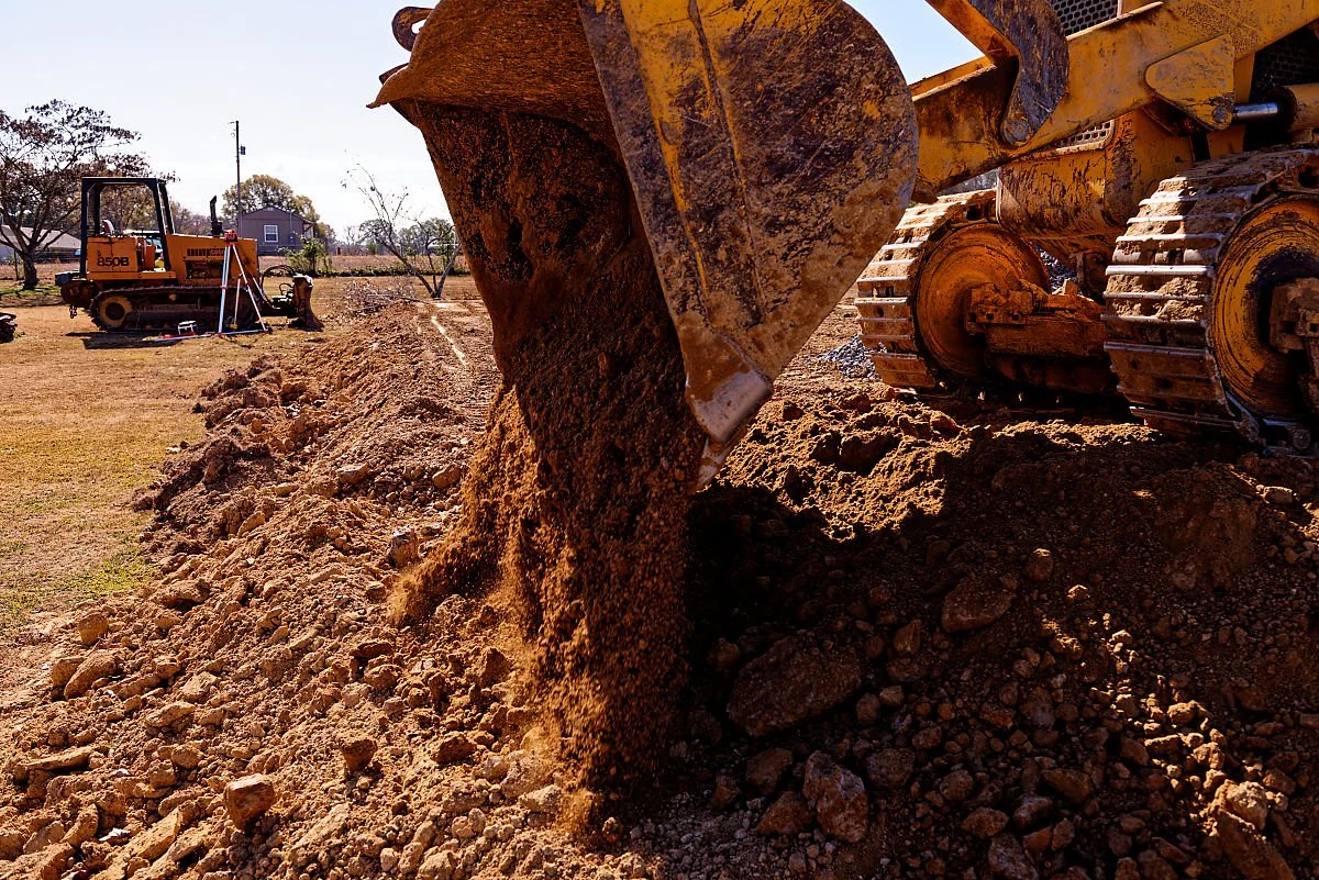 Dump Truck Shale Spreading in Vilonia, AR