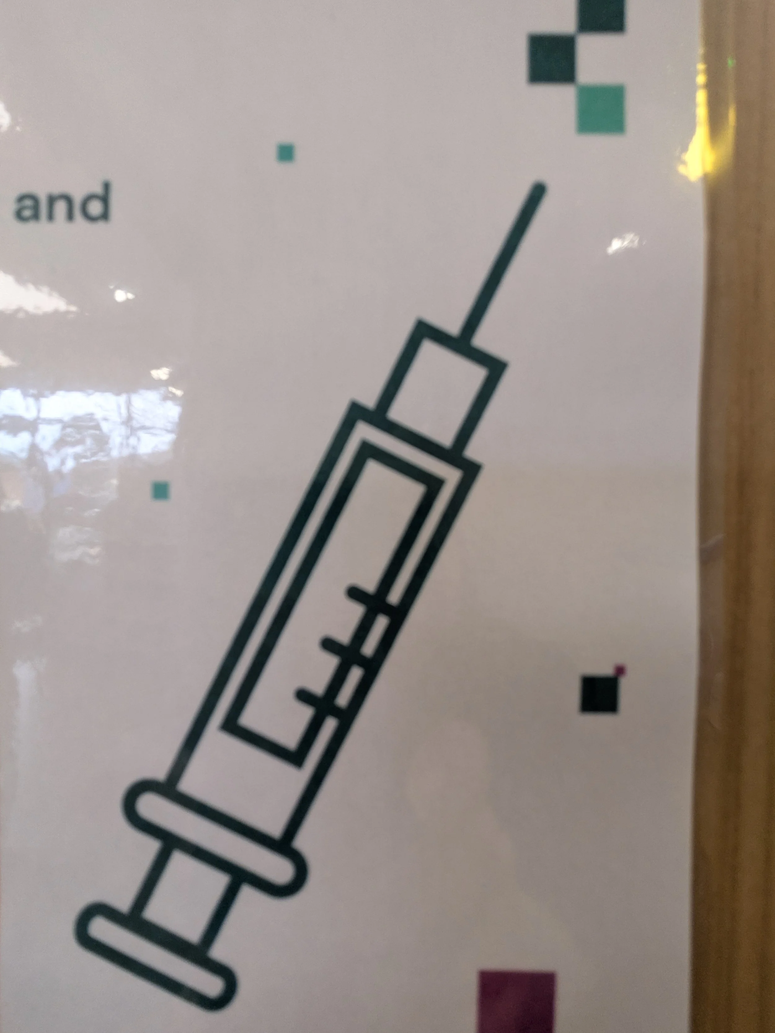 Simple line drawing of a syringe with a needle pointing upward.