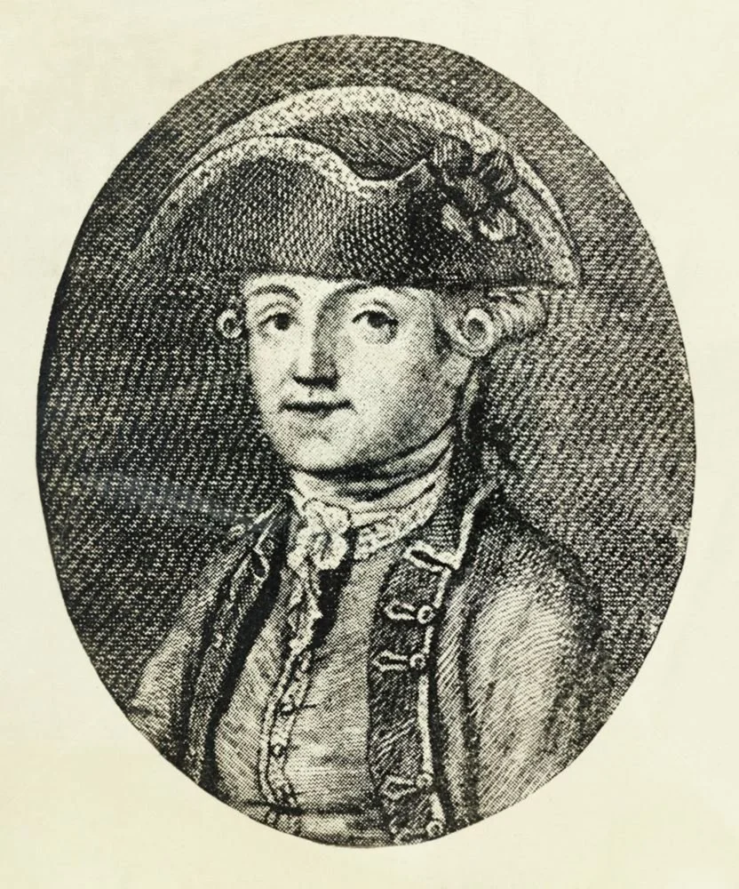 A detailed black and white engraving of a young person wearing a historic military uniform with a high-collared shirt and a sash, and a hat with a feather and a decorative element.