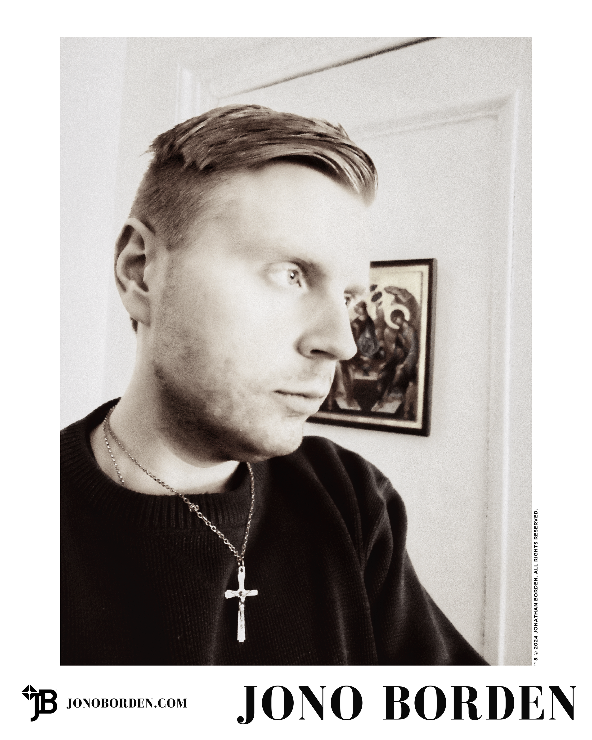 Sepia-toned self-portrait of Jono Borden with styled hair, clean-shaven, facing right frame, with Byzantine religious icon behind him, in an old room, with a door in the background, pensive gaze, wearing a silver crucifix, taken of himself in 2013.