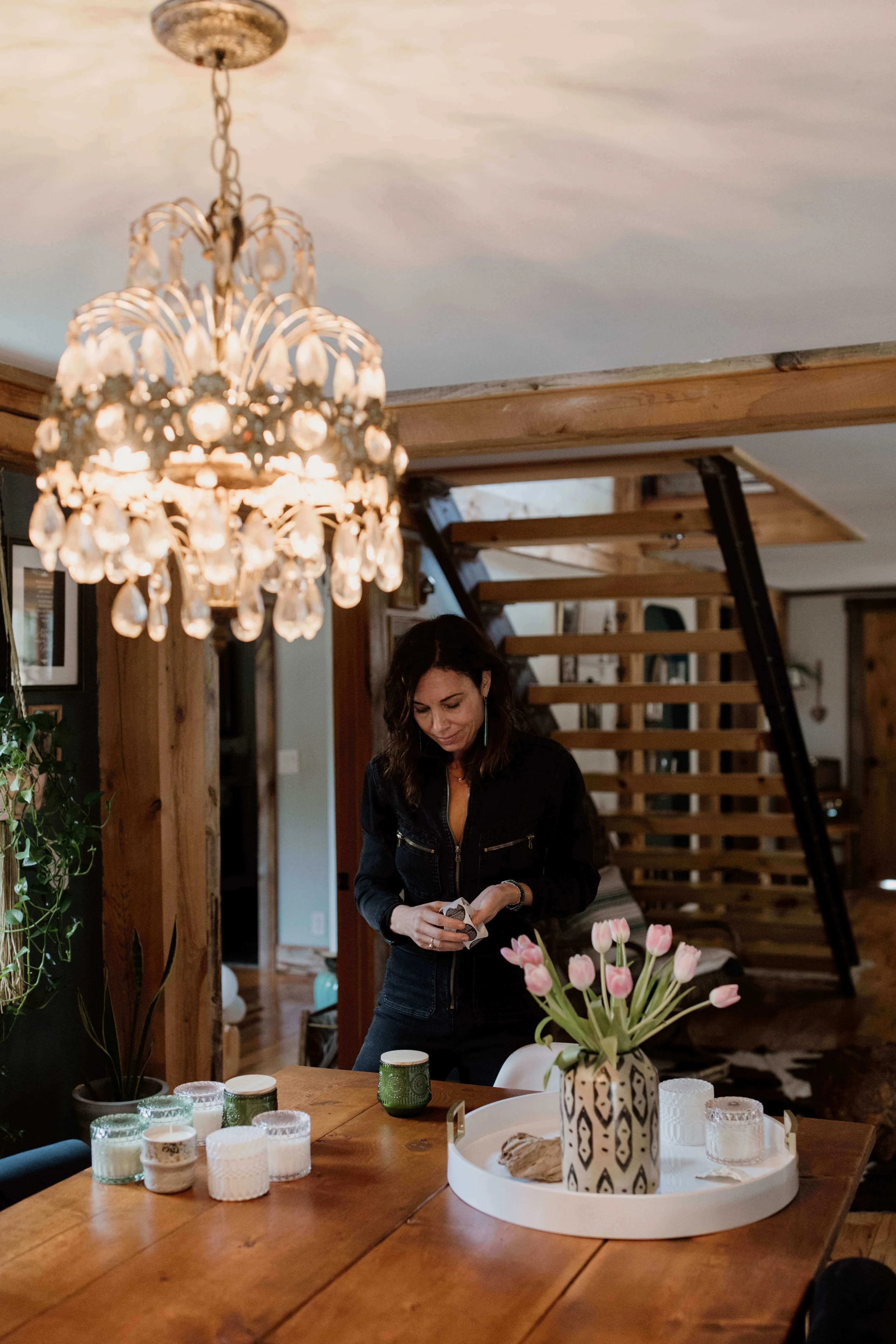 Anne making candles.