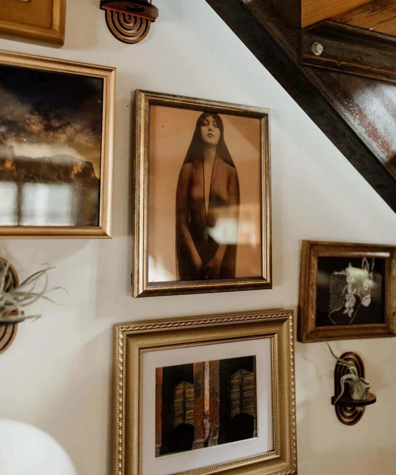 The artwork hanging of Anne's wall.