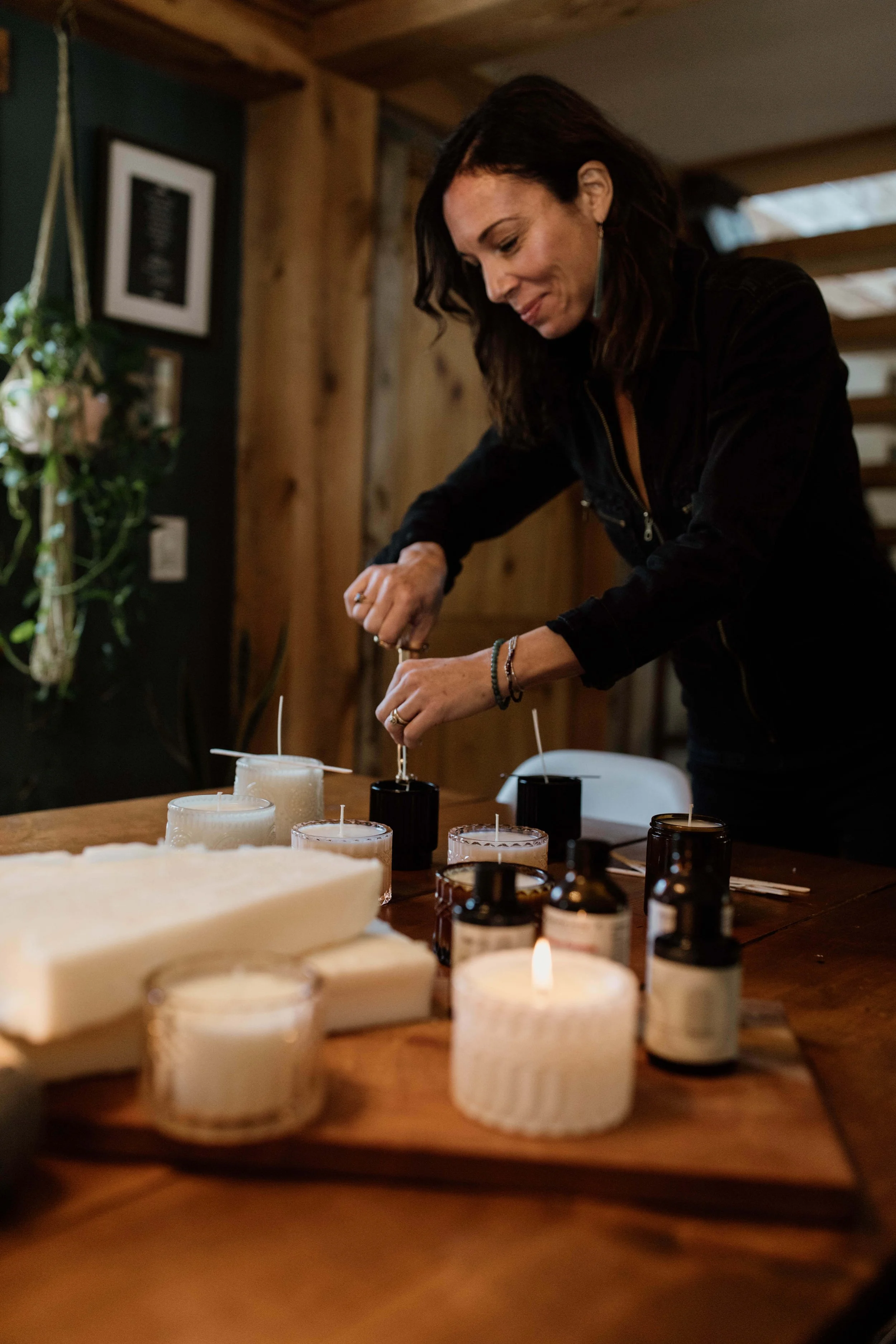 Anne finishing the candle making process.