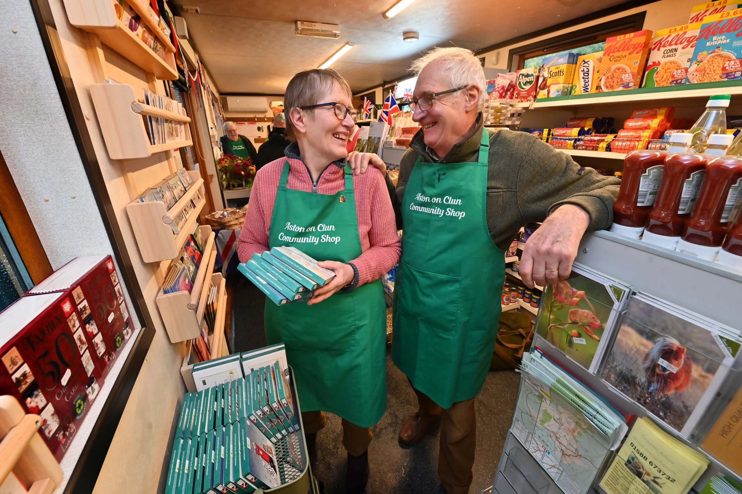 photo of two shop volunteers