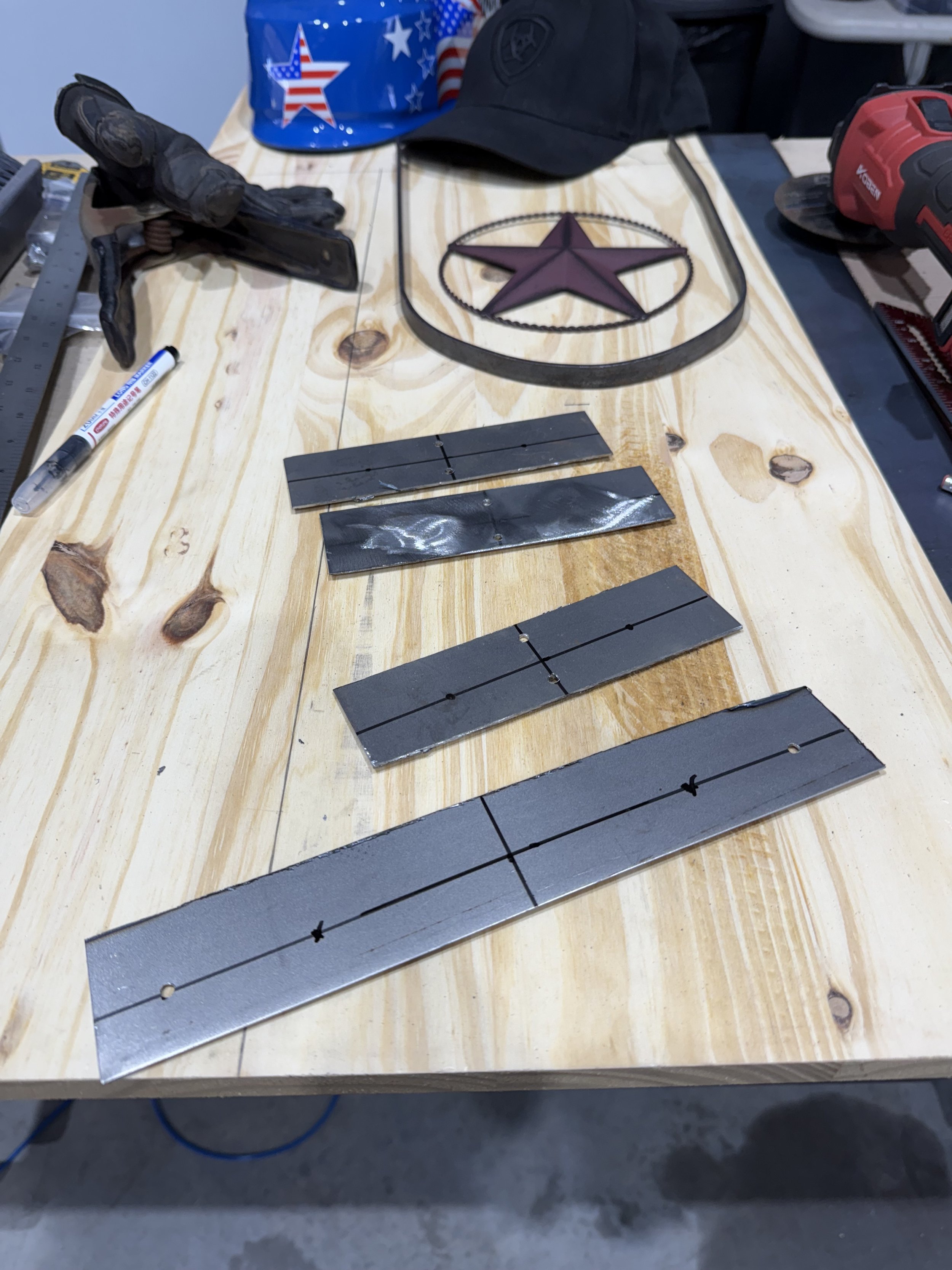 preparing to make the holes on the back brackets for the western cowboy har tri rack