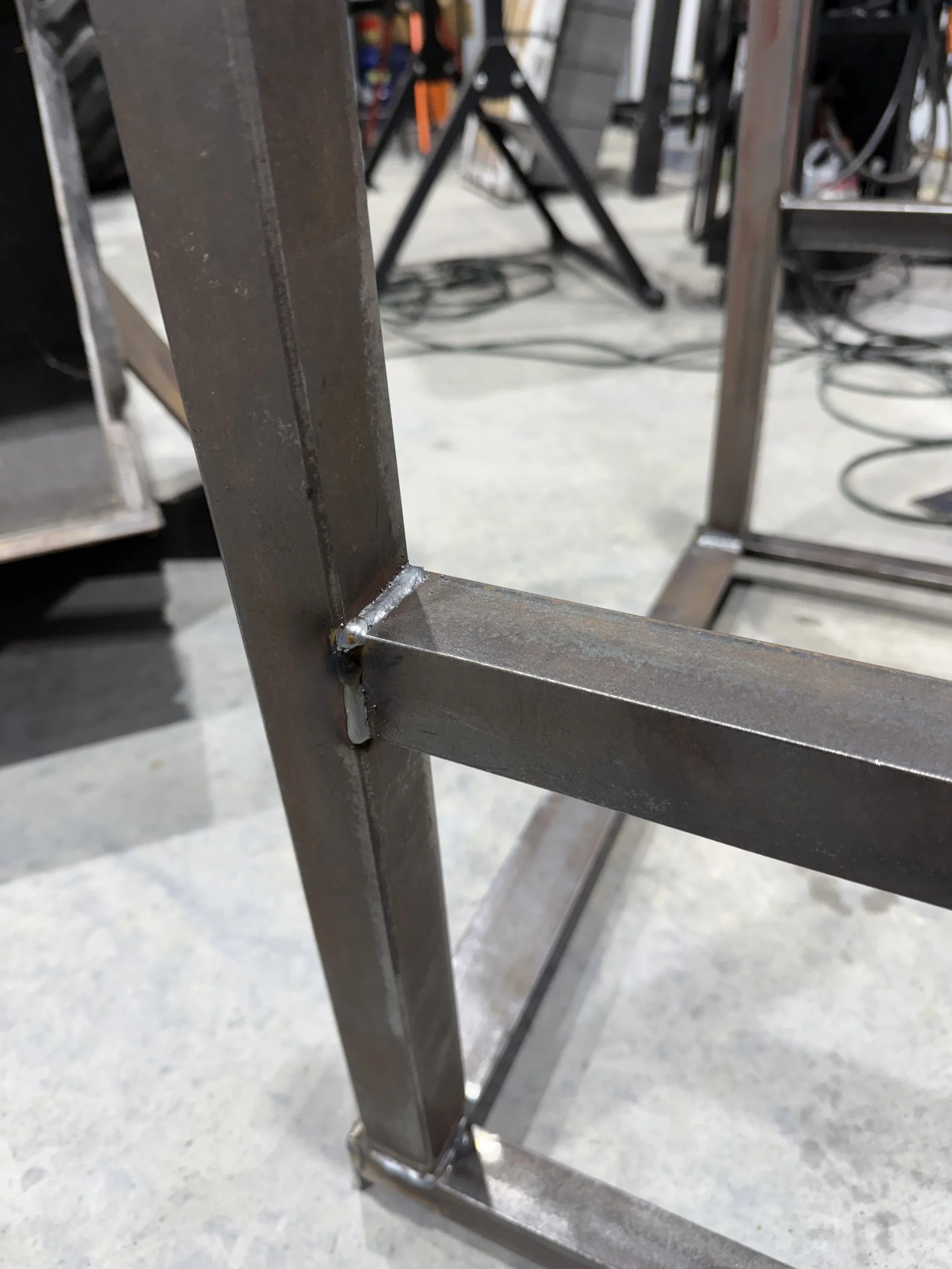 close up of weld on base