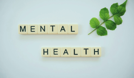 Letter tiles spelling out MENTAL HEALTH