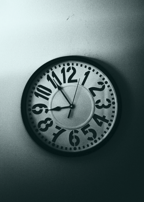 an analogue clock on the wall