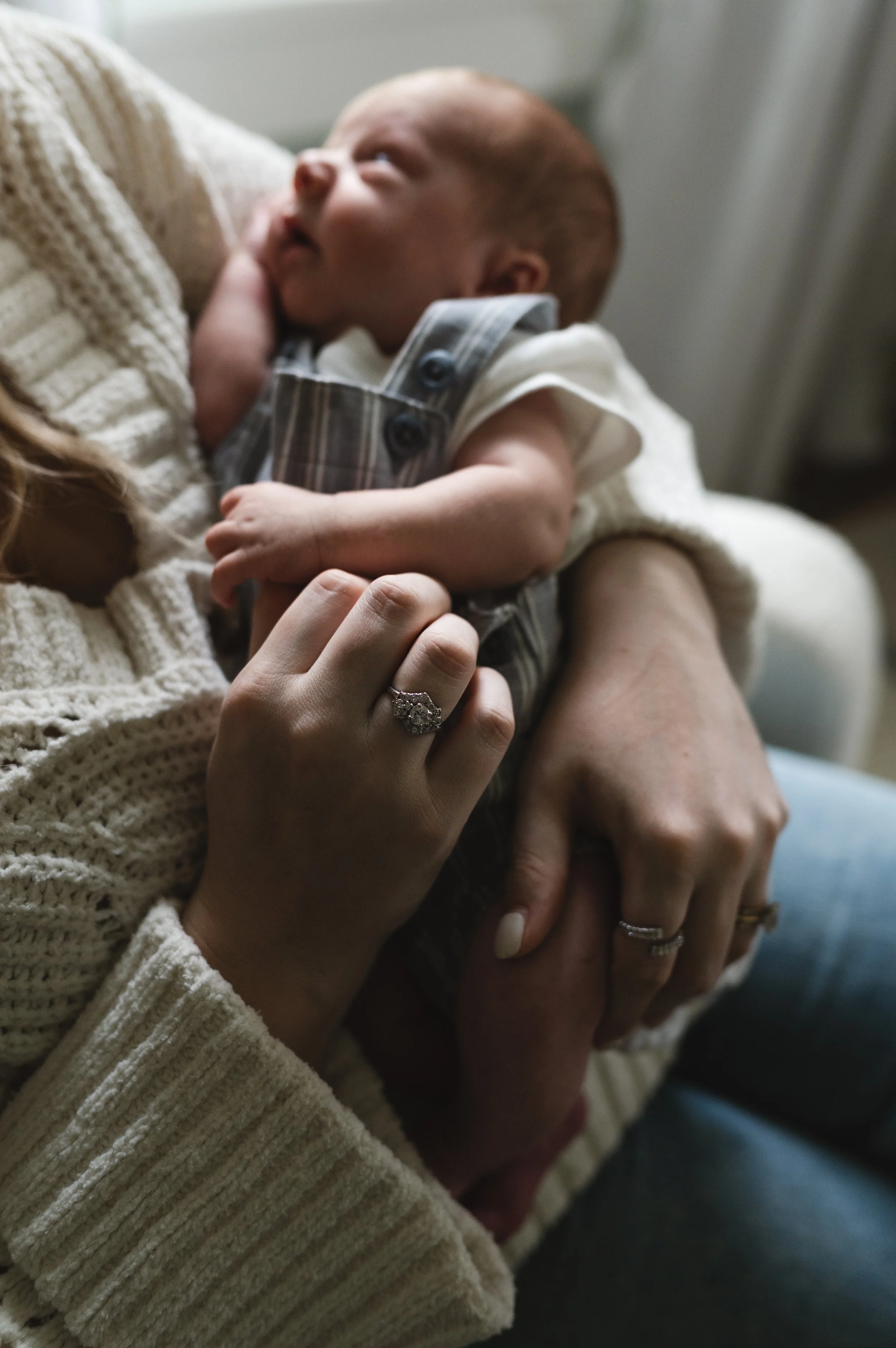 moody, hands holding sleeping newborn, nursery, newborn photos, newborn photography, newborn photographer, clarksville tn, nashville tn