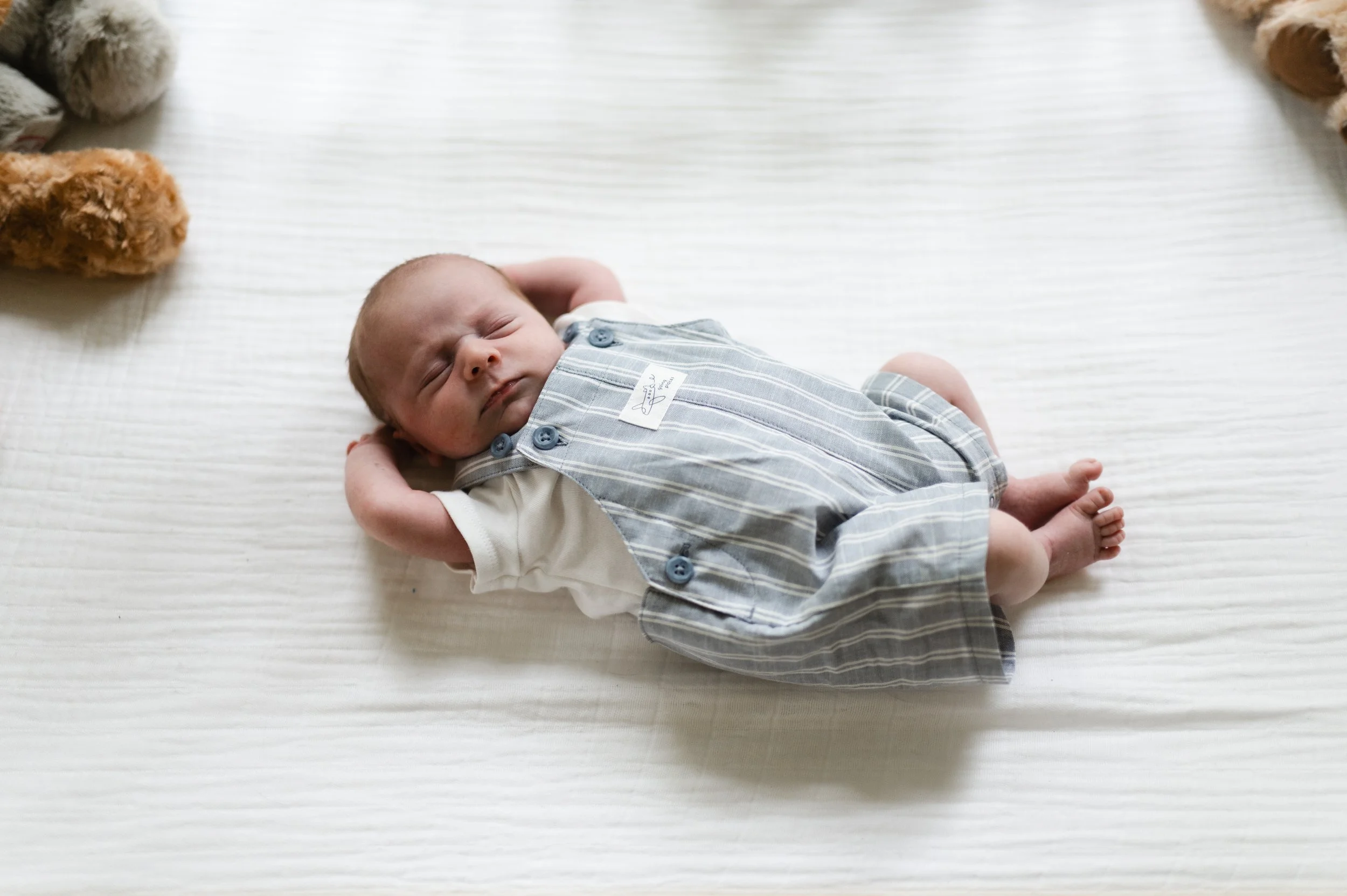 sleeping newborn baby in crib, nursery, newborn photographer, clarksville tennessee, nashville tennessee, affordable