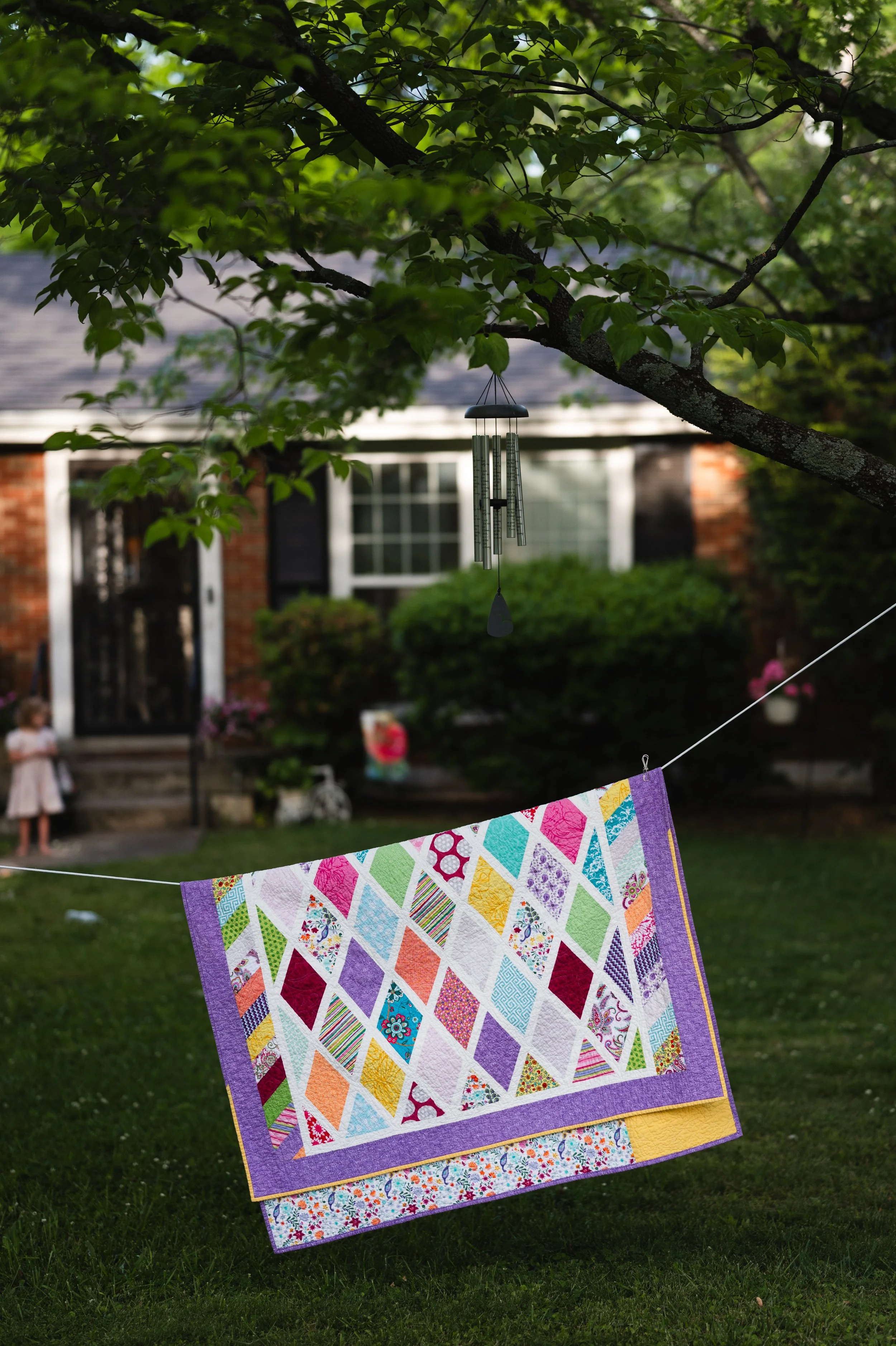 quilt in yard in front of house, clarksville tn photographer, nashville tn photographer, storytelling family photography, family photos
