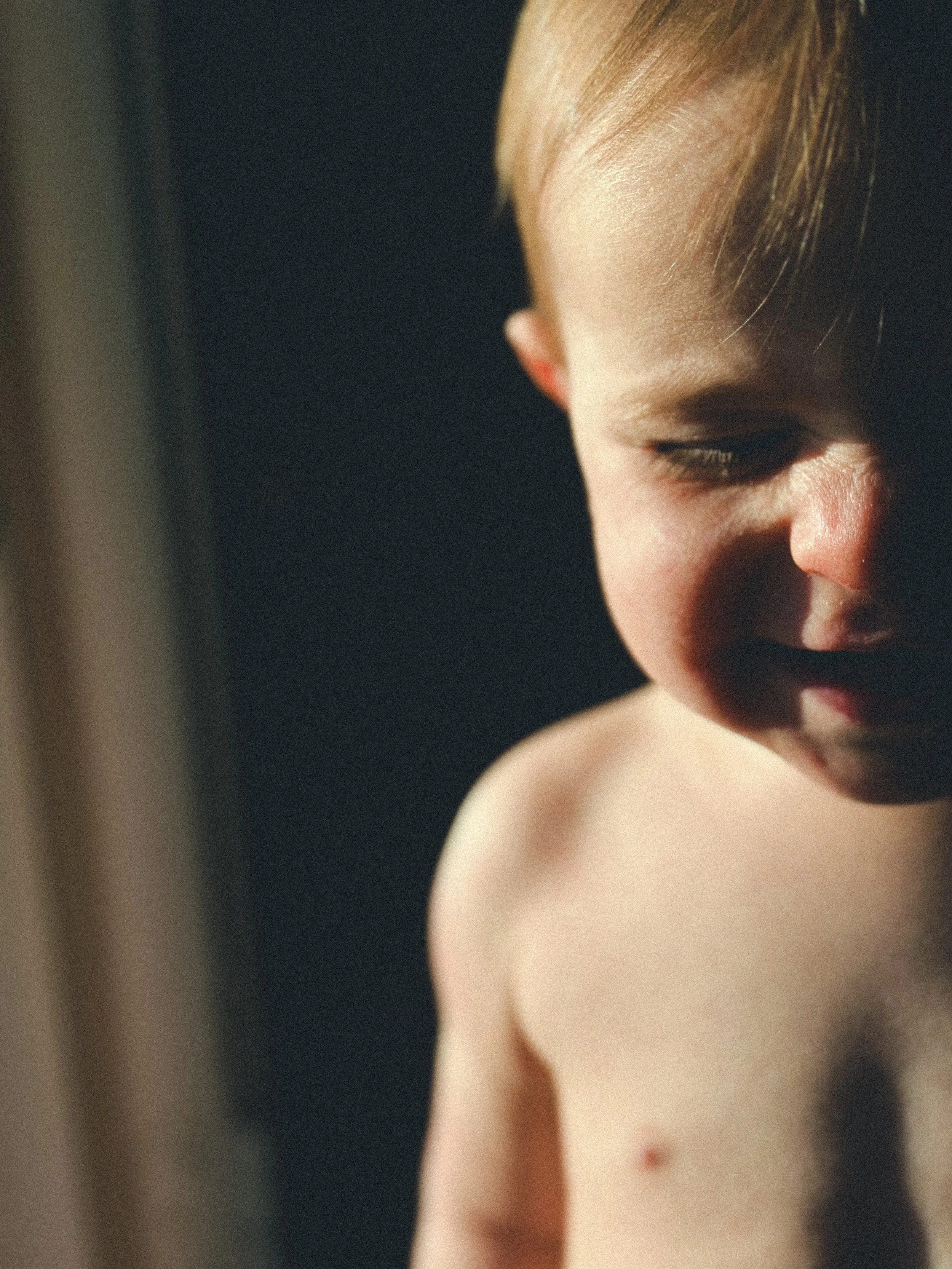 baby boy stands in sunlight smiling, clarksville tn, nashville tn, military family, photographer, moody, documentary, lifestyle, affordable