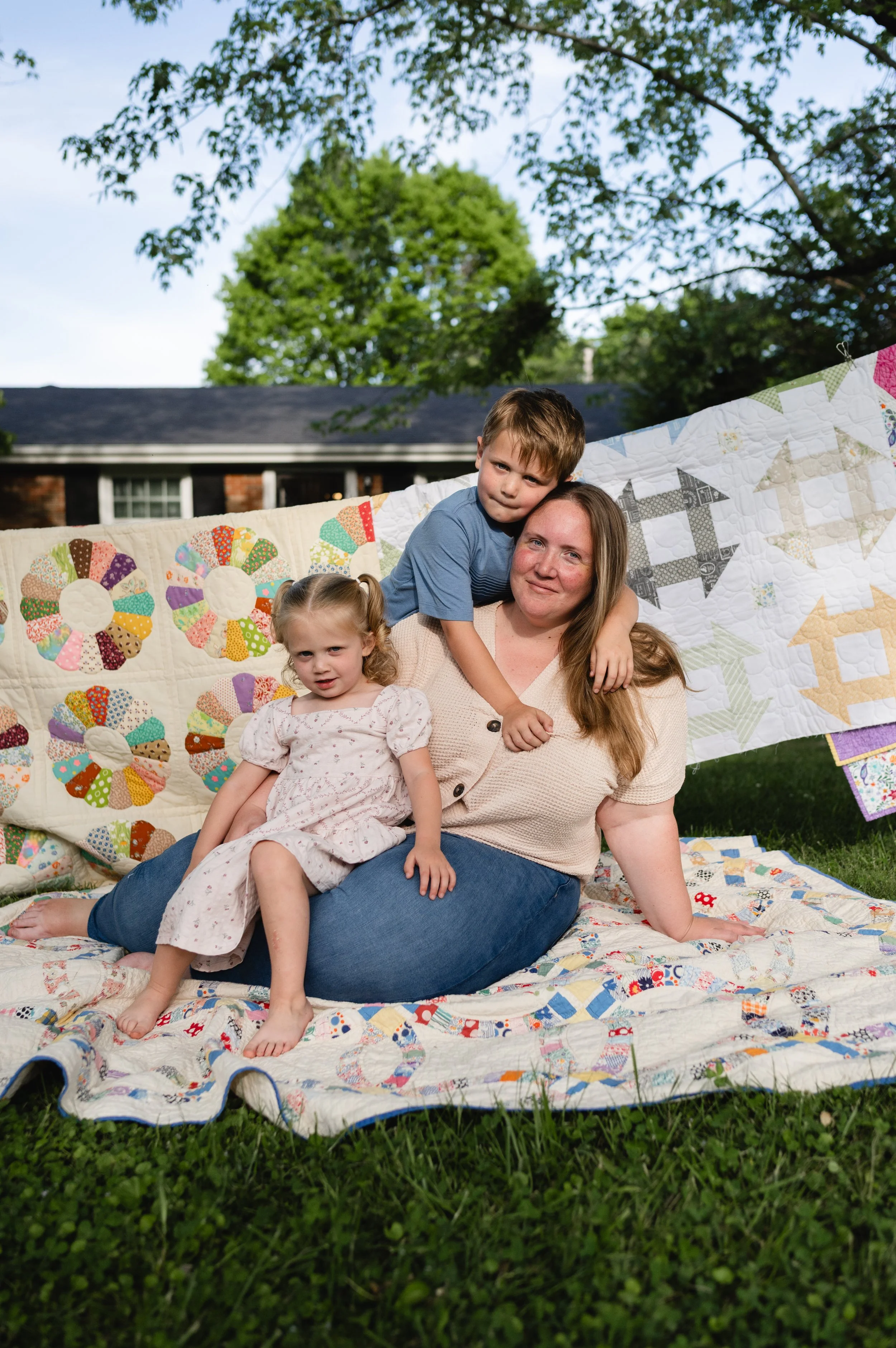 mother and children in yard, motherhood photographer, motherhood session, clarksville tn, affordable, nashville tn