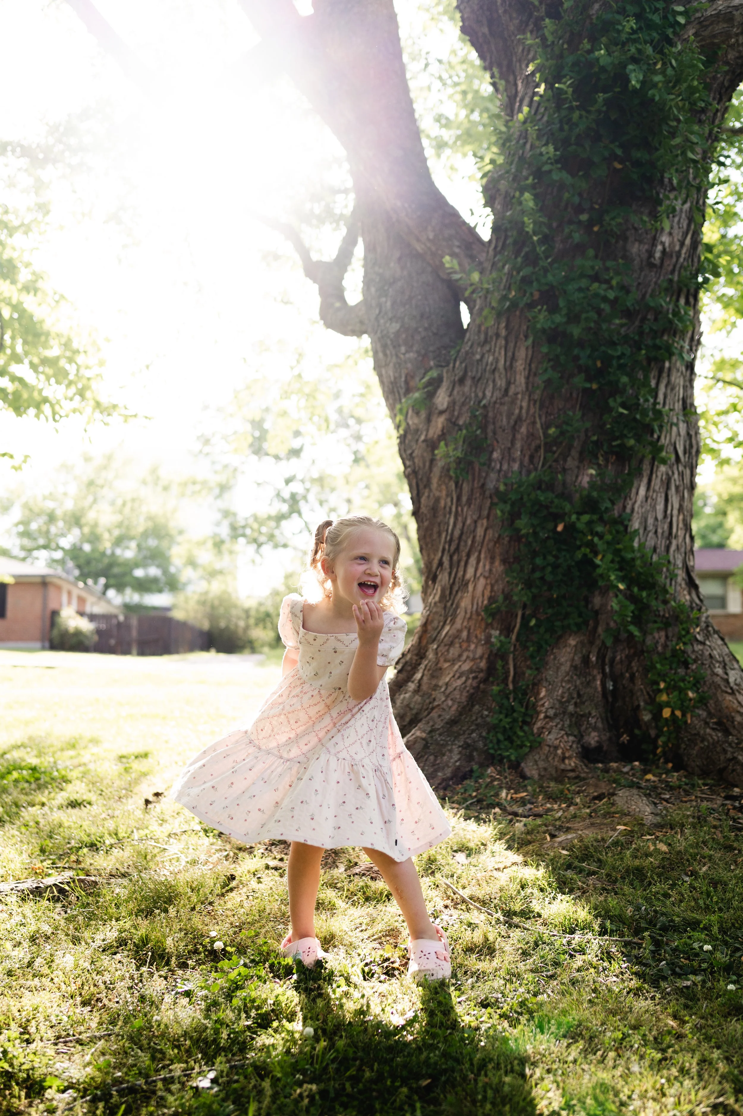girl twirling dress, home session, candid family photos, affordable, clarksville tn photographer, nashville tn photographer