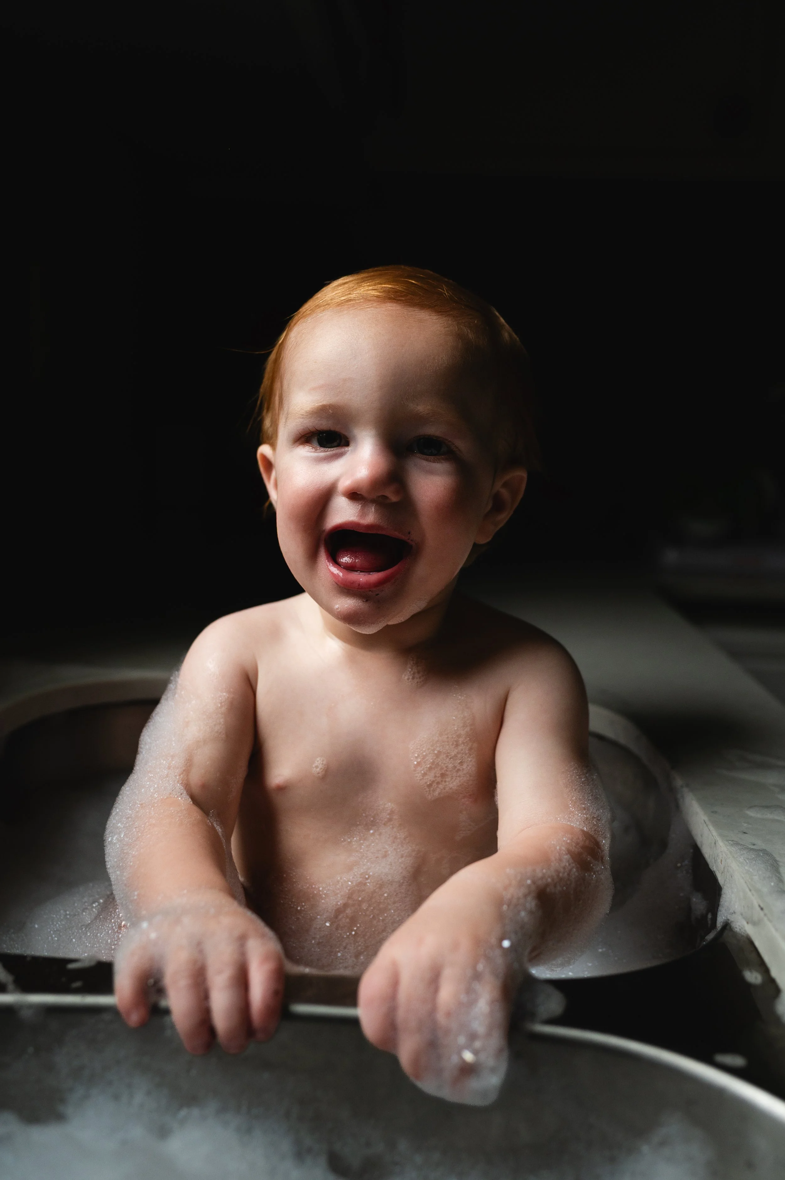toddler with red hair in sink, photographer, milestone, birthday photos, clarksville tennessee