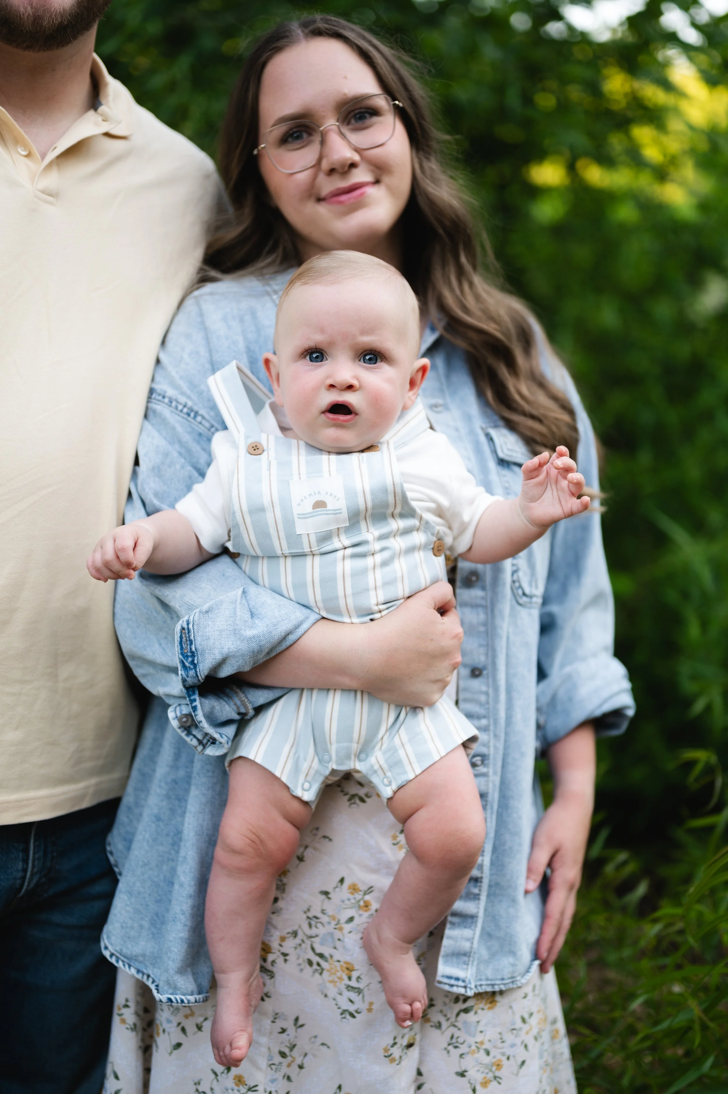 mother holding baby outdoors, affordable, family photographer, nashville and clarksville tennessee