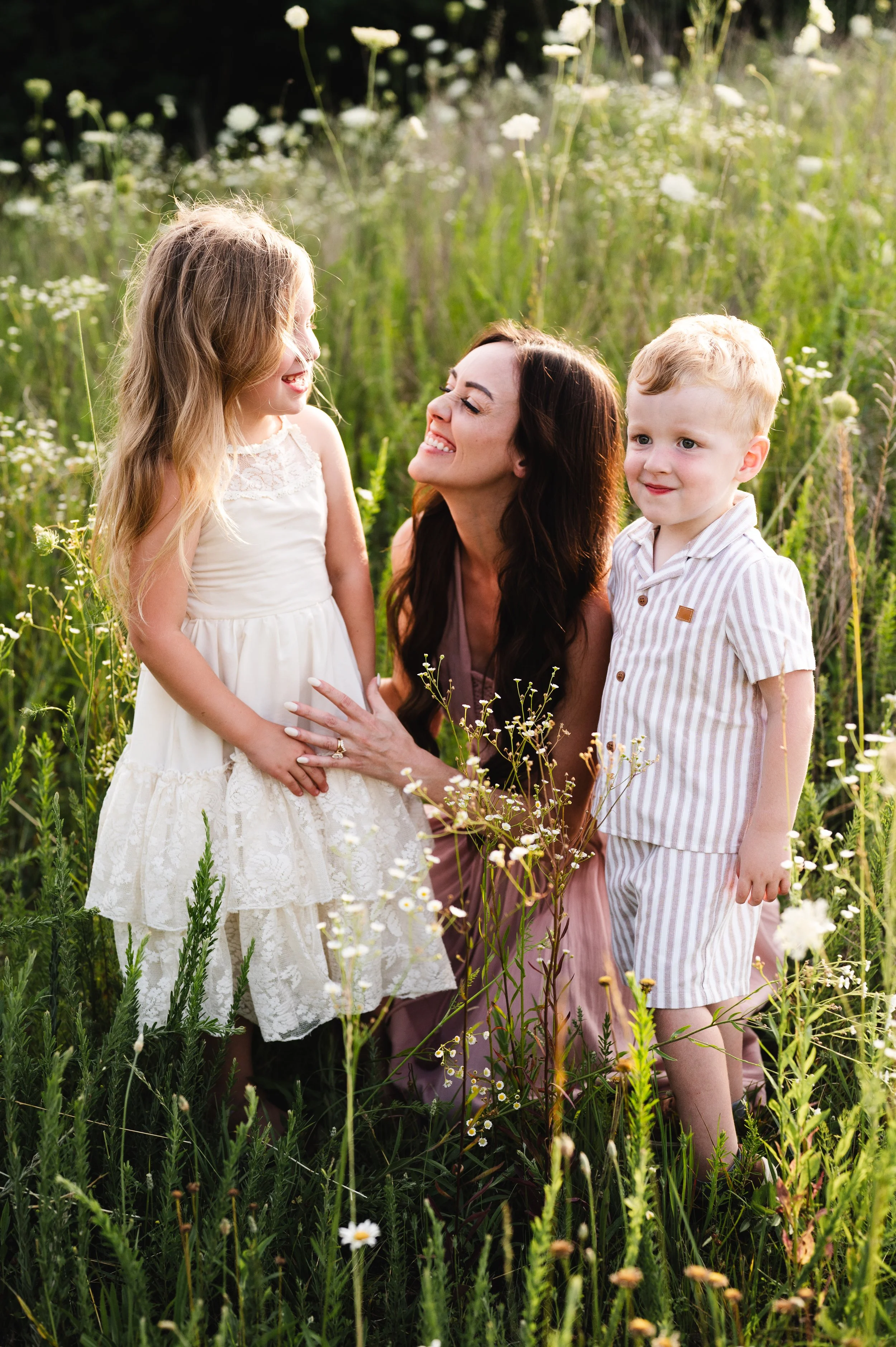 woman with young children in flower field at sunset, clarksville tennessee, nashville, photographer