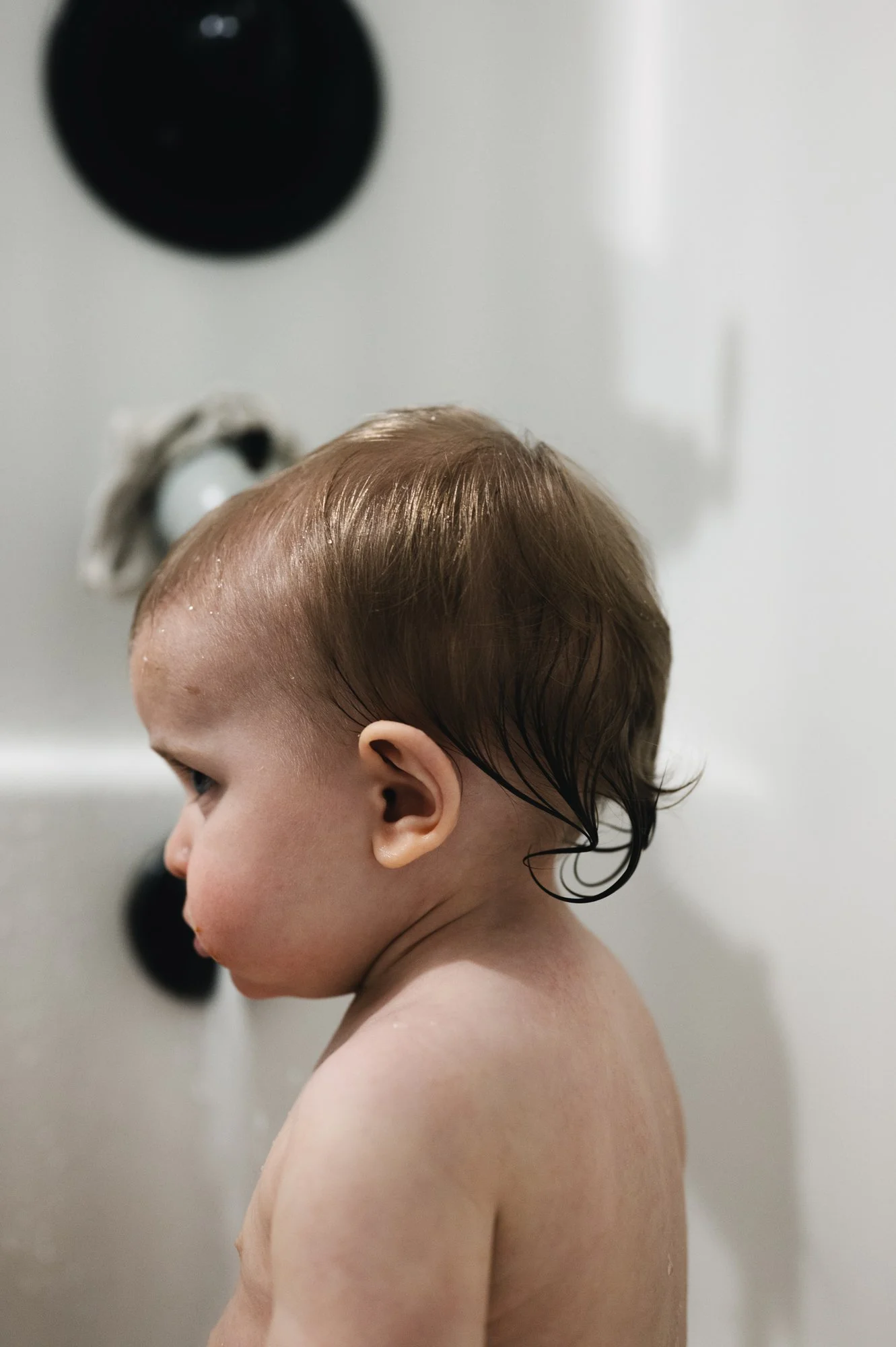 profile image of baby boy sitting in bathtub with wet hair, photographer, affordable, documentary, lifestyle, motherhood, nashville tennessee, clarksville tennessee