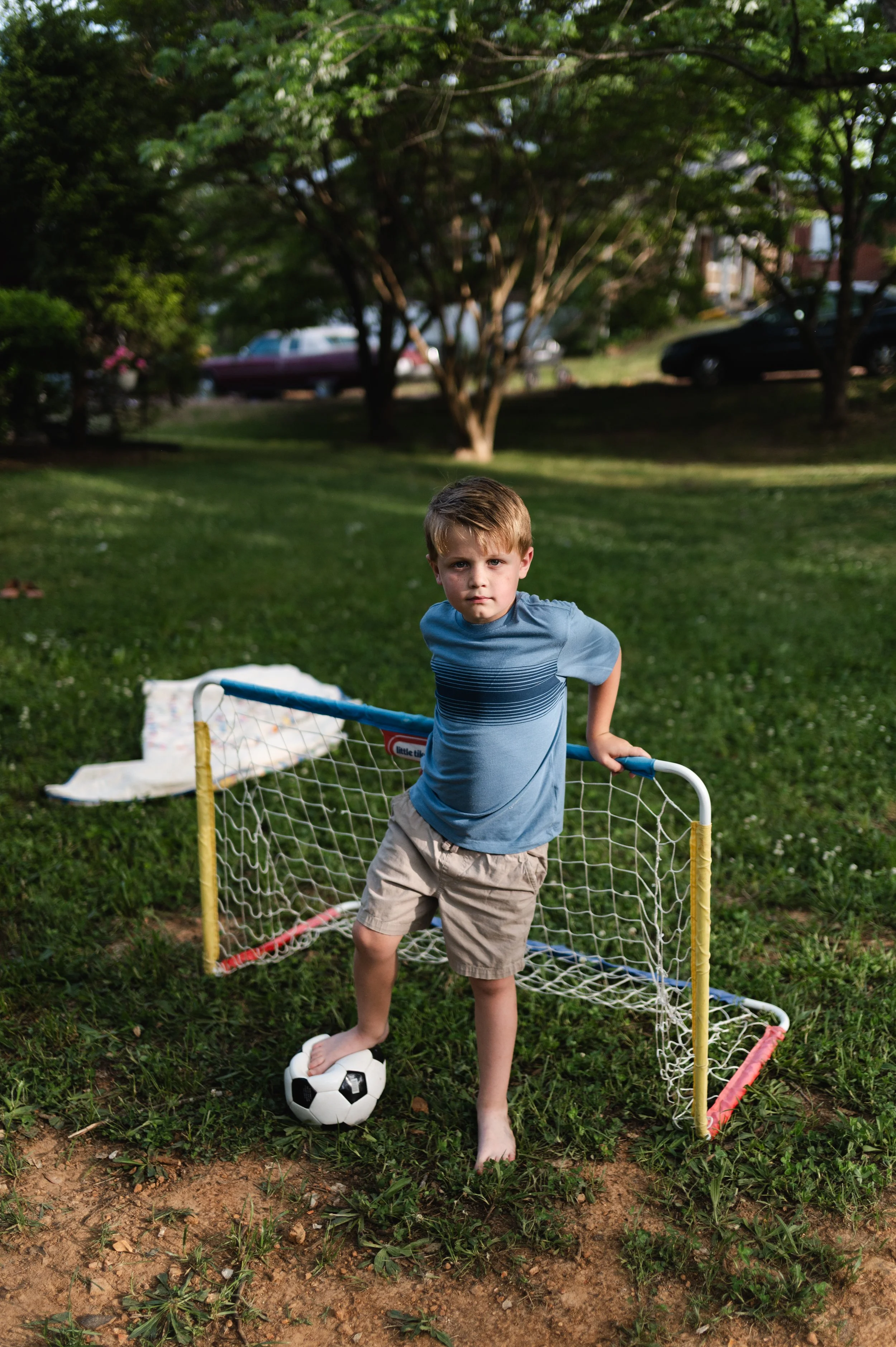 boy with soccer ball and net, clarksville tn photographer, nashville tn photographer, family photographer, affordable