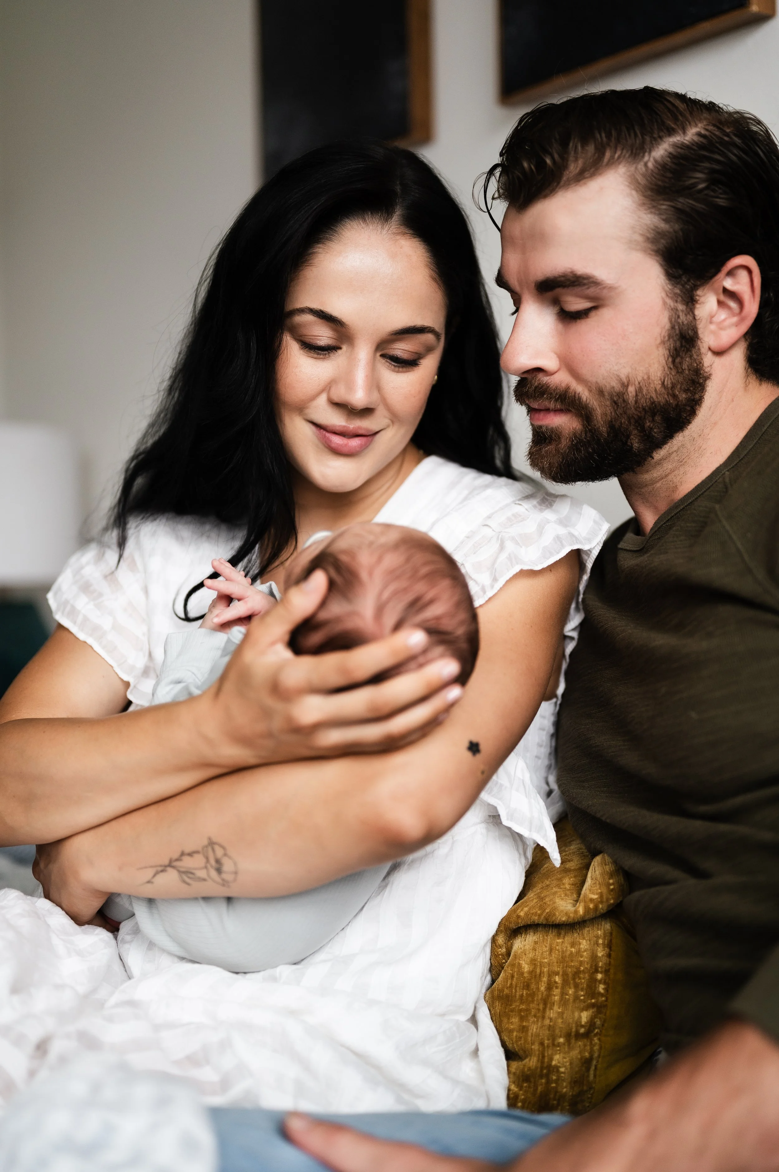 man and woman with newborn baby, newborn photographer, affordable, clarksville and nashville tennessee