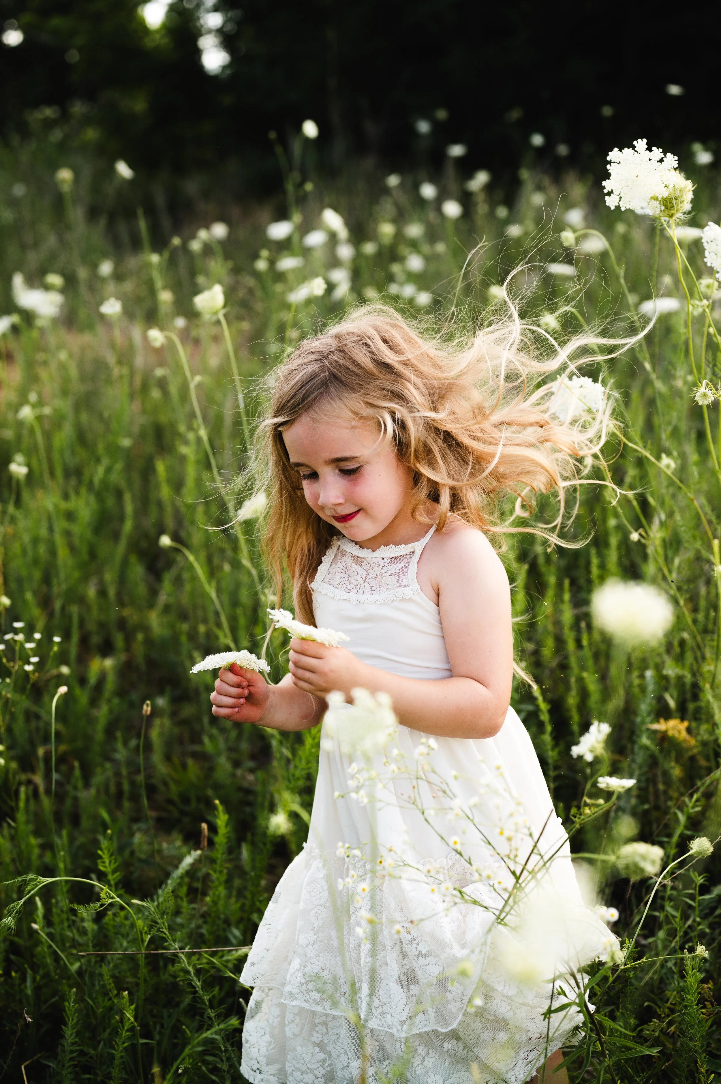 young girl in white flower field, clarksville and nashville tennessee, affordable, photographer