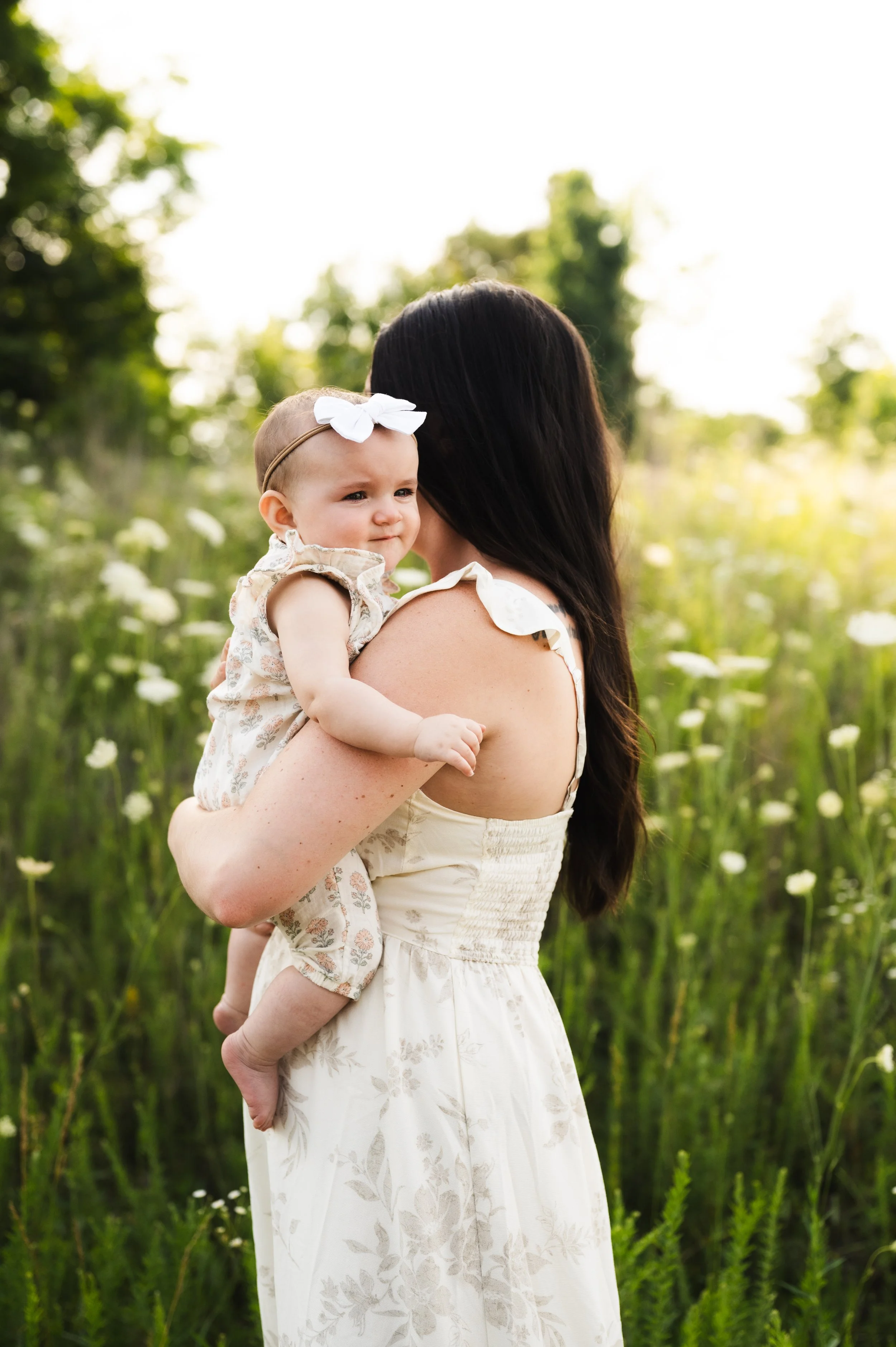 woman with baby in flower field, clarksville tennessee, photographer, affordable