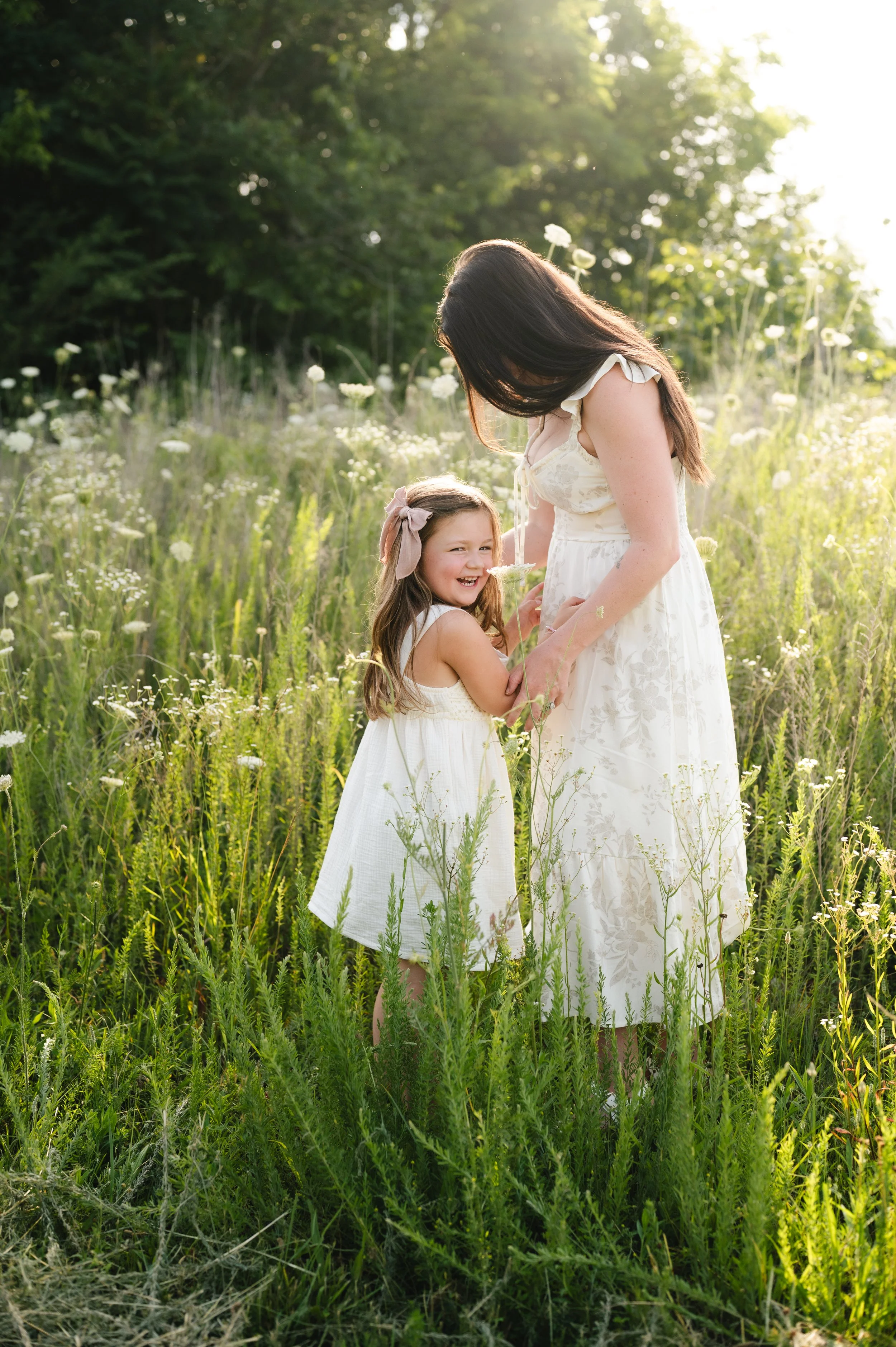 mother and daughter in flower field at sunset, clarksville and nashville tennessee, photographer