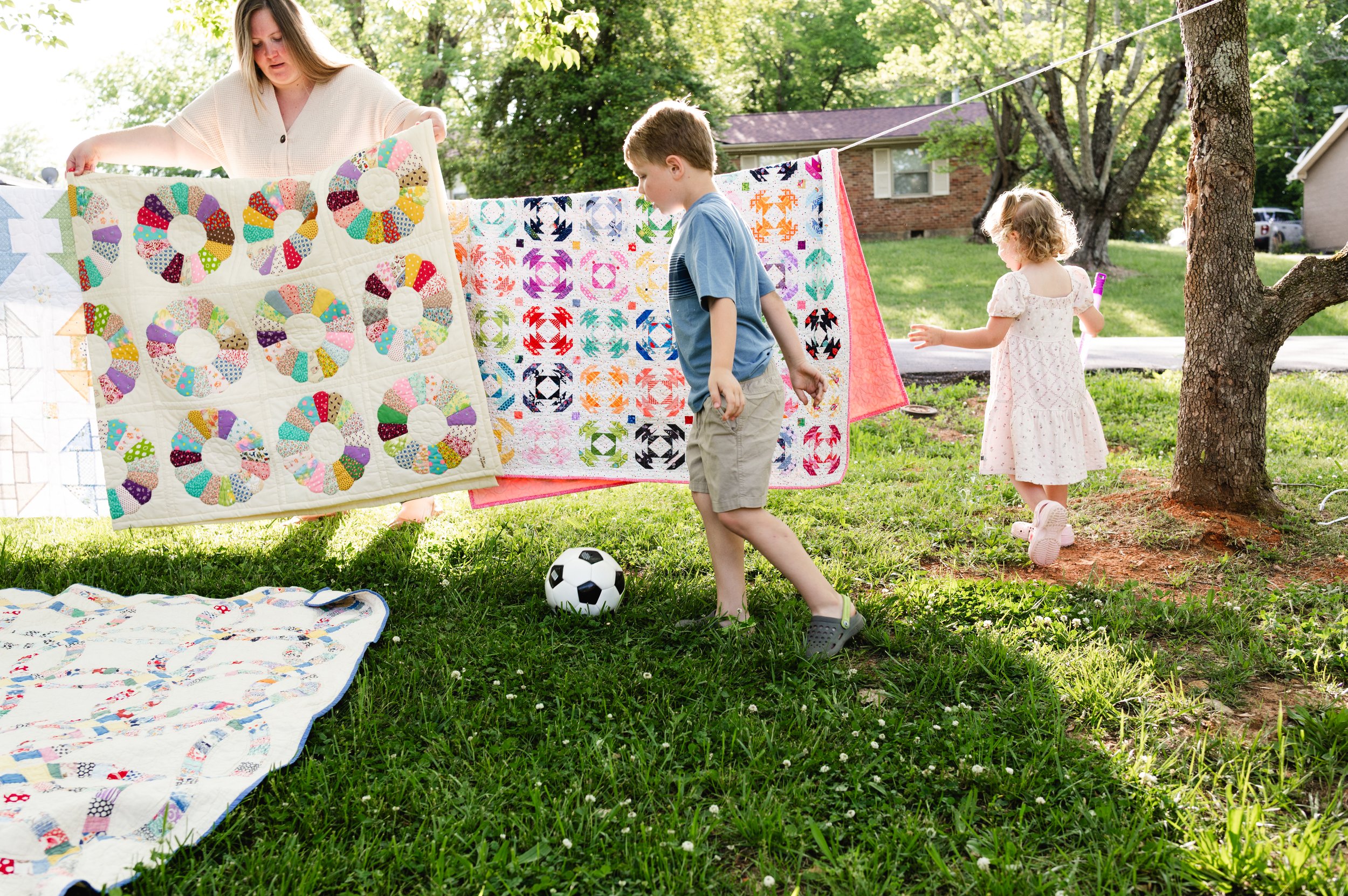 mother and children play in yard, clarksville tn, nashville tn, affordable, motherhood photograher, family photographer