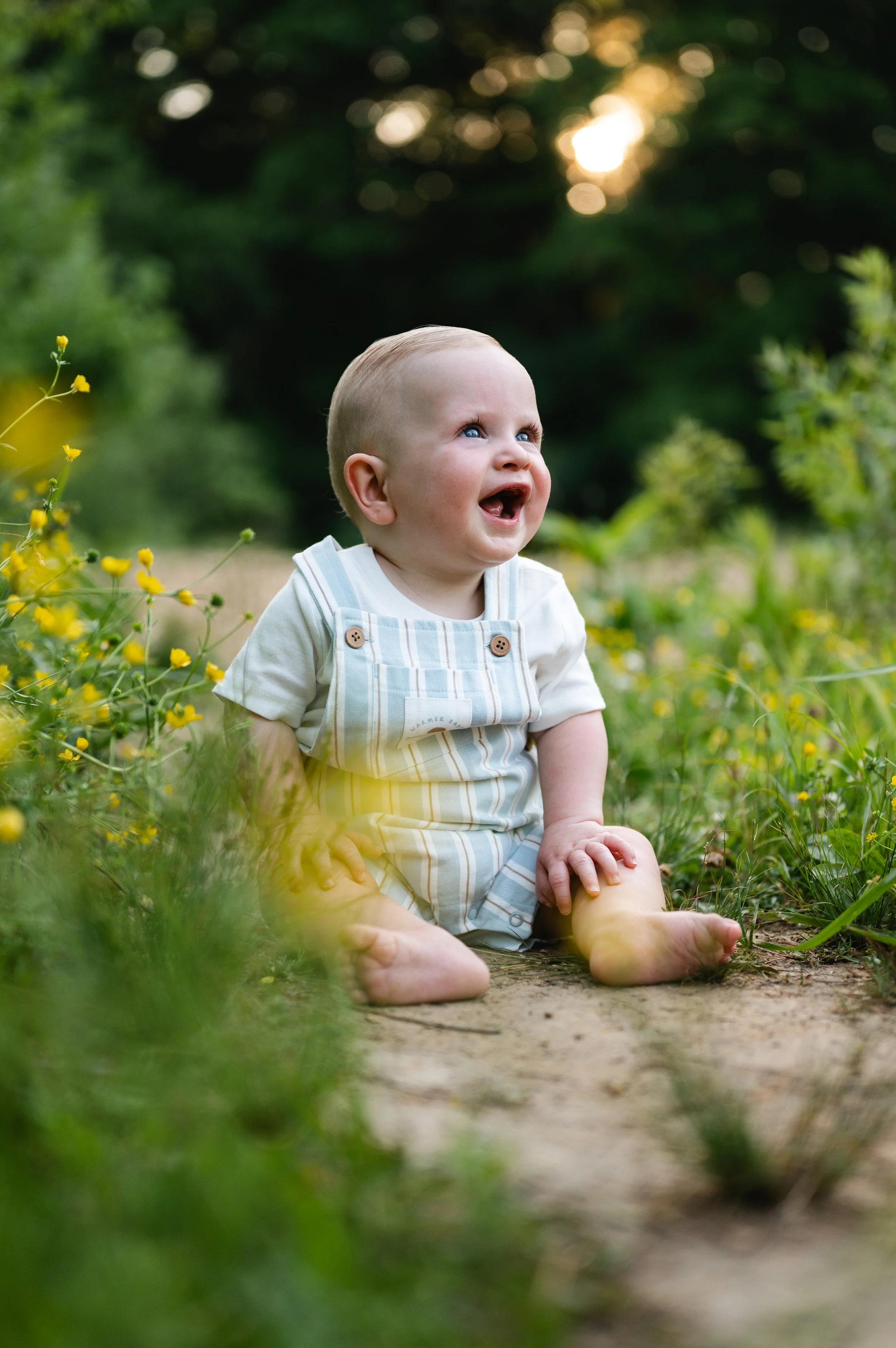 baby with yellow flowers, family photos, photographer, clarksville and nashville tennessee
