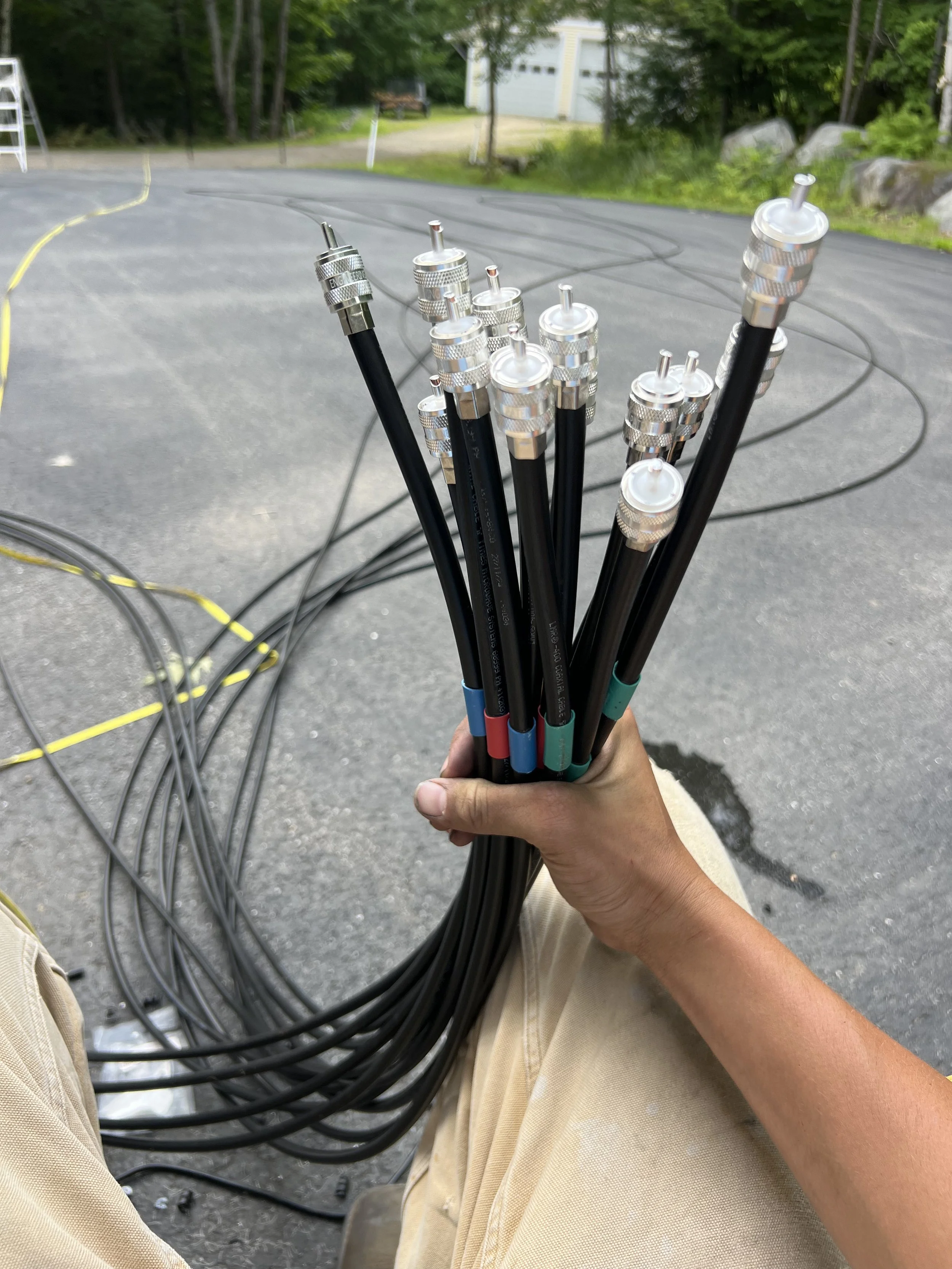 Color-coded coaxial feedline bundle — LMR hardline installation and multi-feedline routing contractor