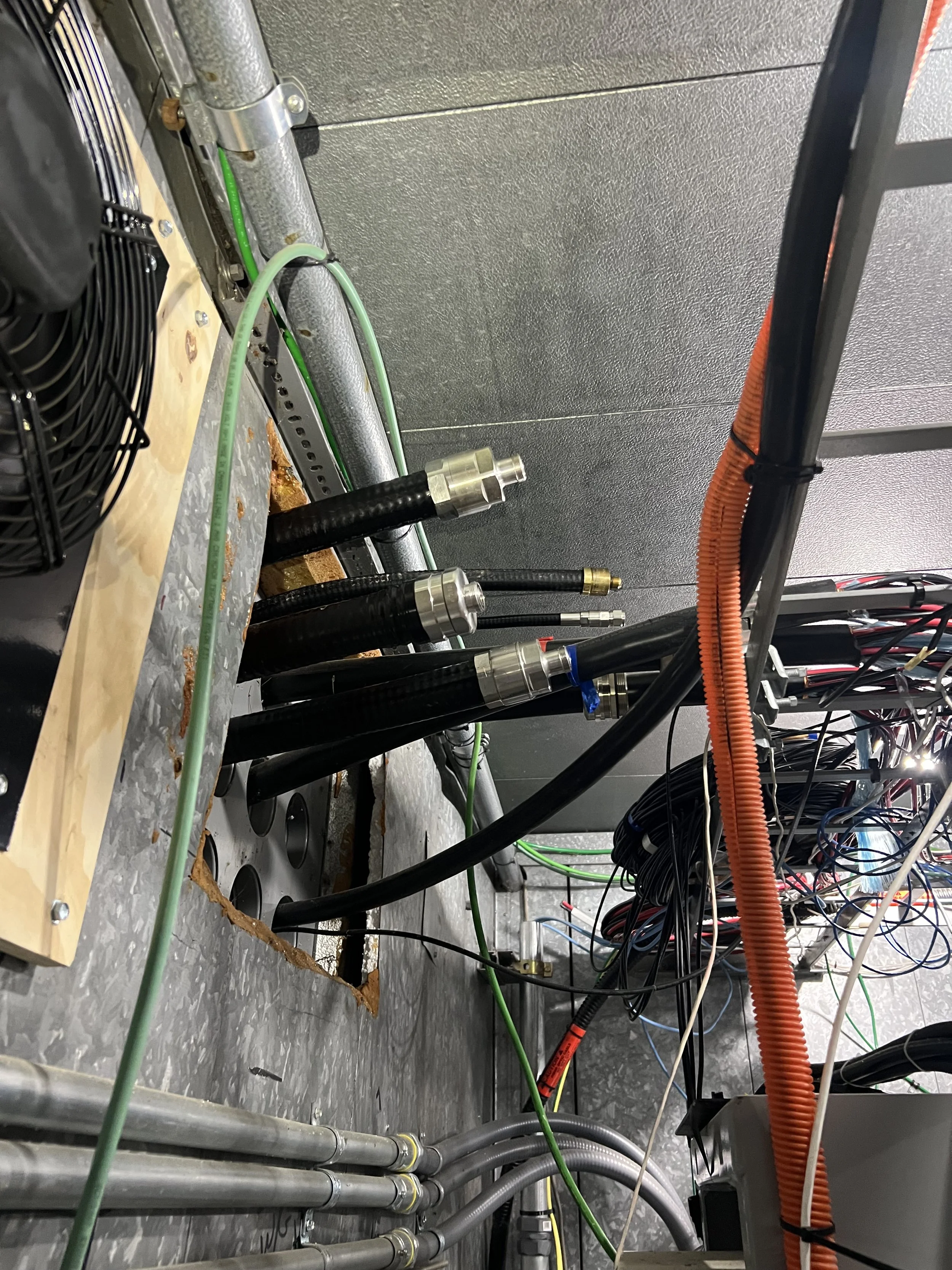 Coaxial feedline routing and weathersealing installation — RF feedline management and connector work, tower and antenna contractor