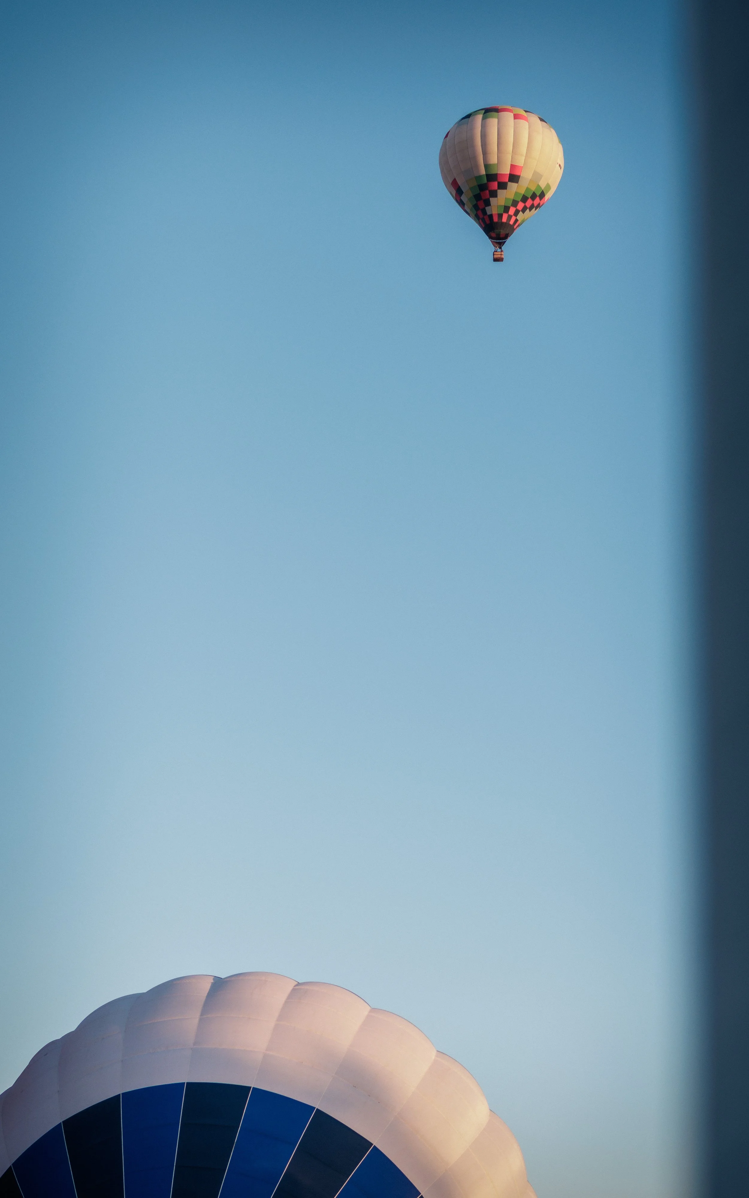 A scenic composition of hot air balloons flying high above Mexico.