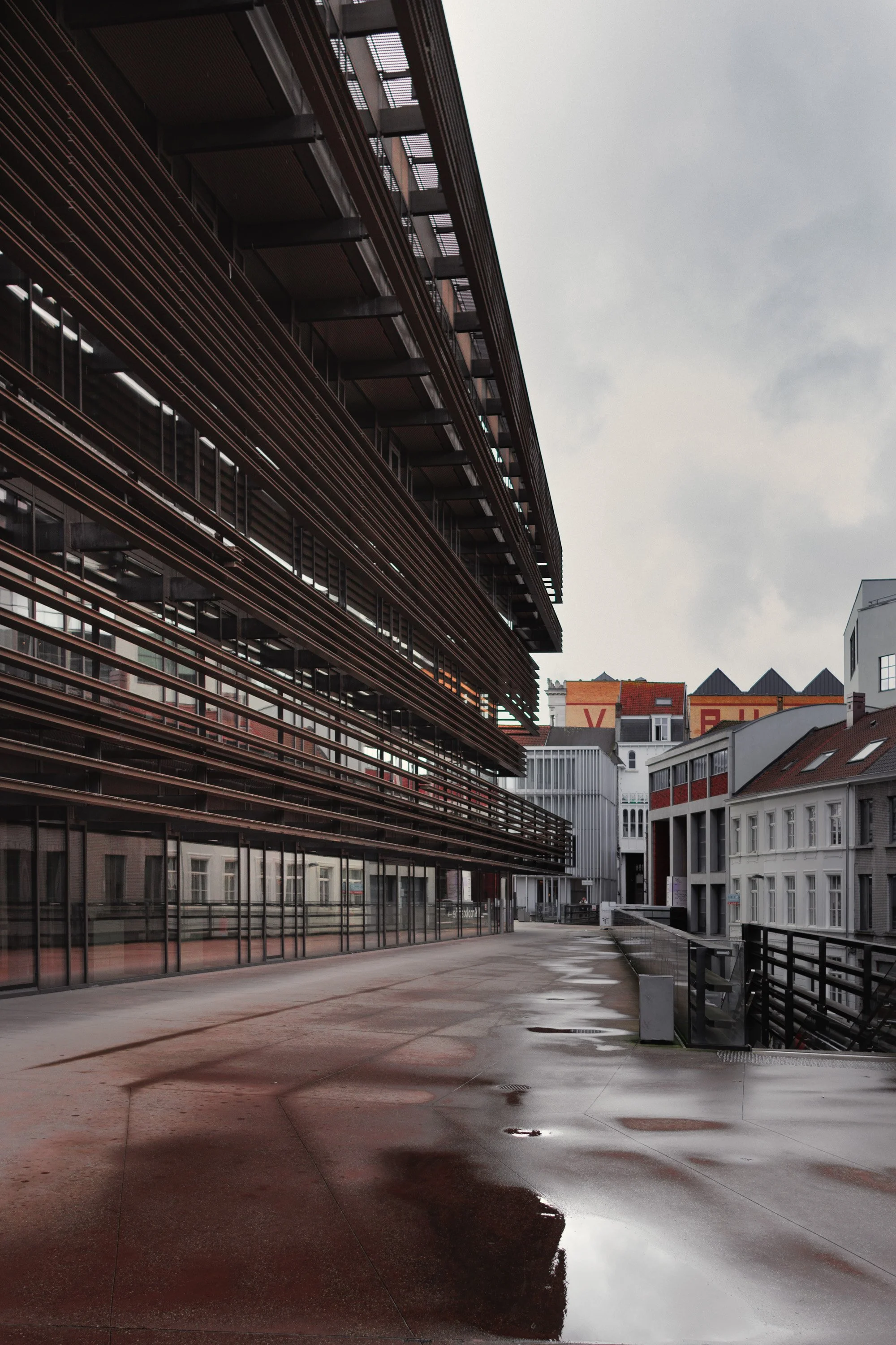 Outside architectural photograph of De Krook in Ghent on a rainy day. Taken in 2024.