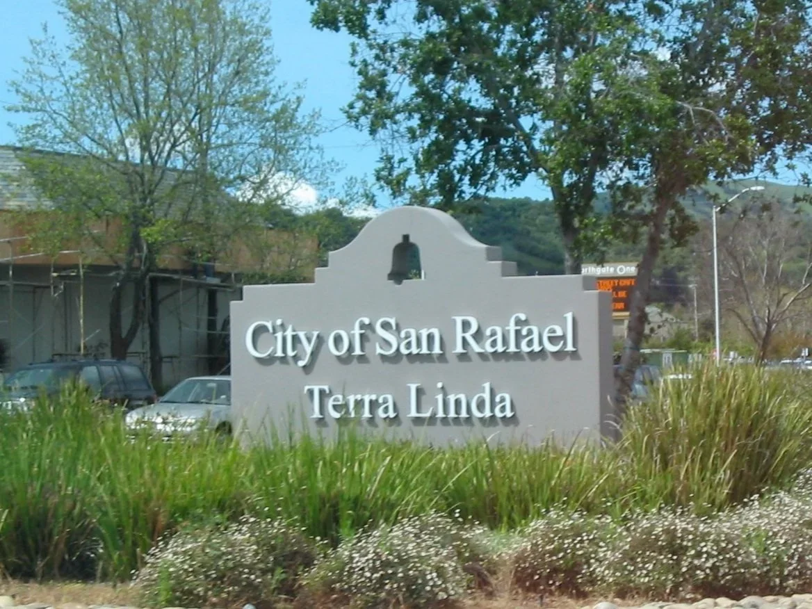 Sign for the City of San Rafael, Terra Linda, with greenery and trees around it.