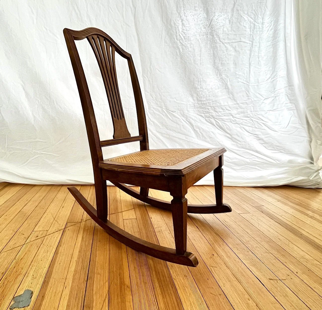 vintage-cane-seat-rocking-chair-side-view.jpg