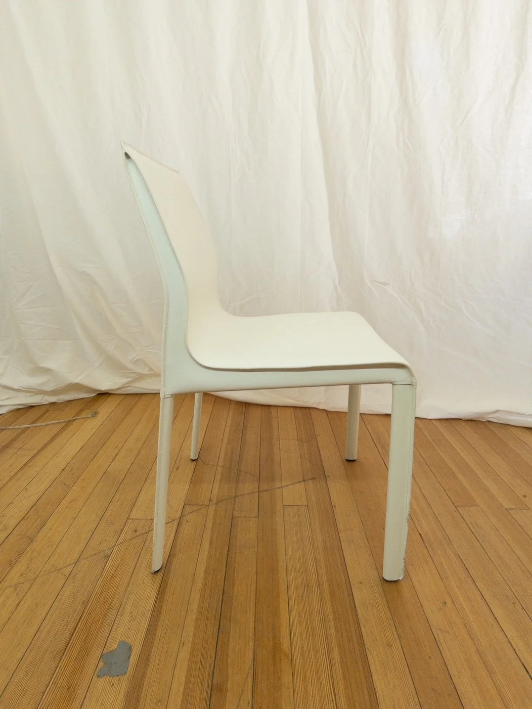 nuevo-colter-dining-chair-white-leather-left-side.JPG