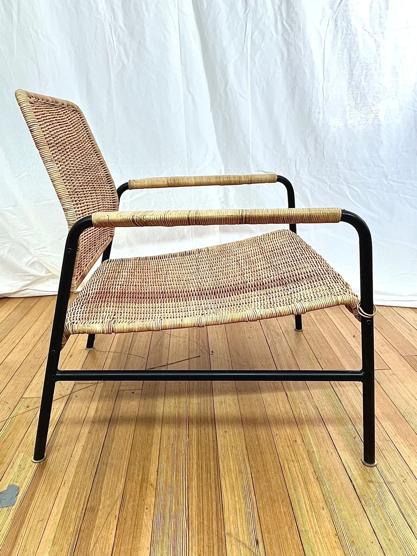woven-rattan-armchairs-black-metal-frame-set-of-2-side.jpg
