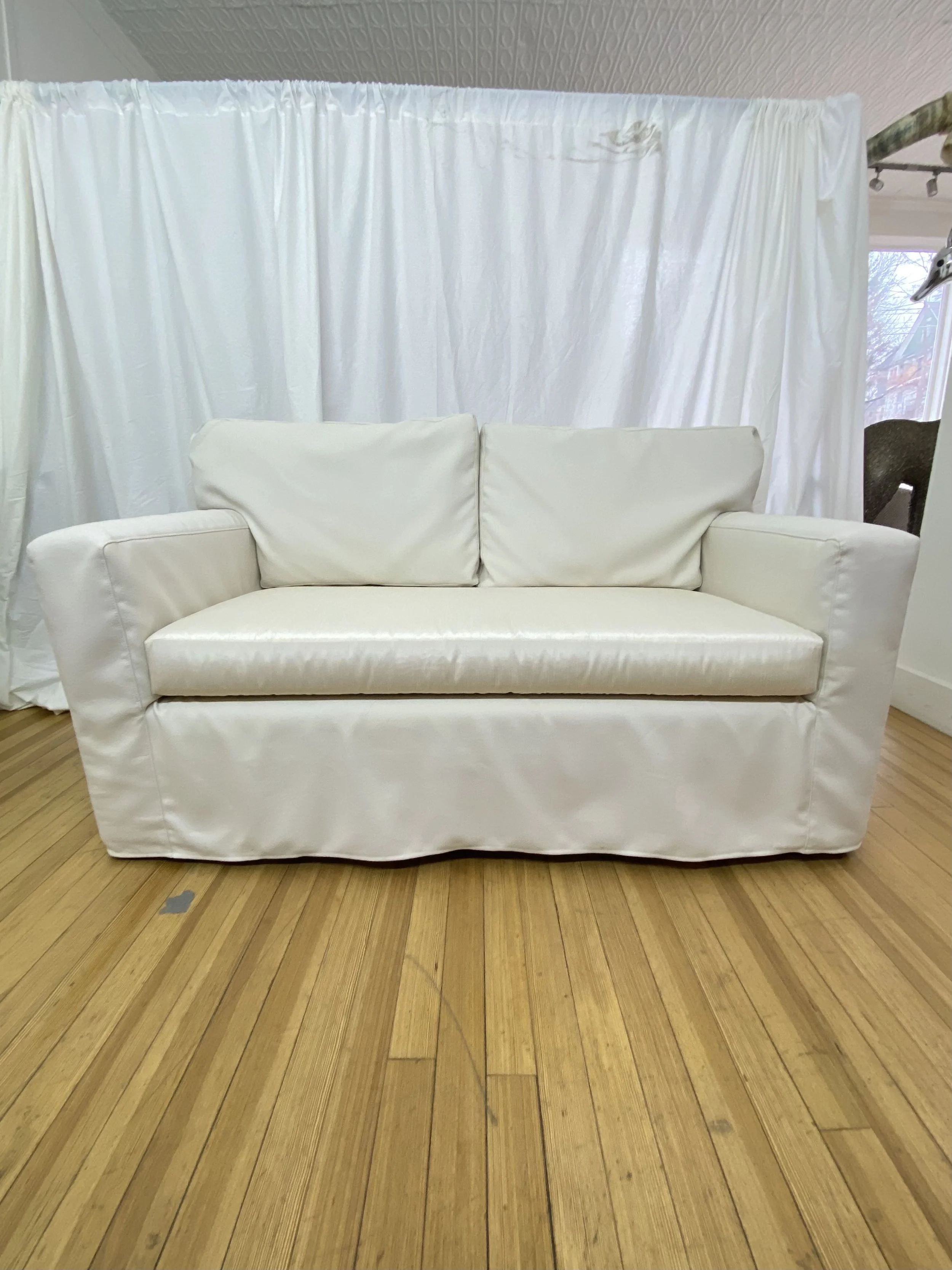 custom-linen-slipcovered-loveseat-front.jpg