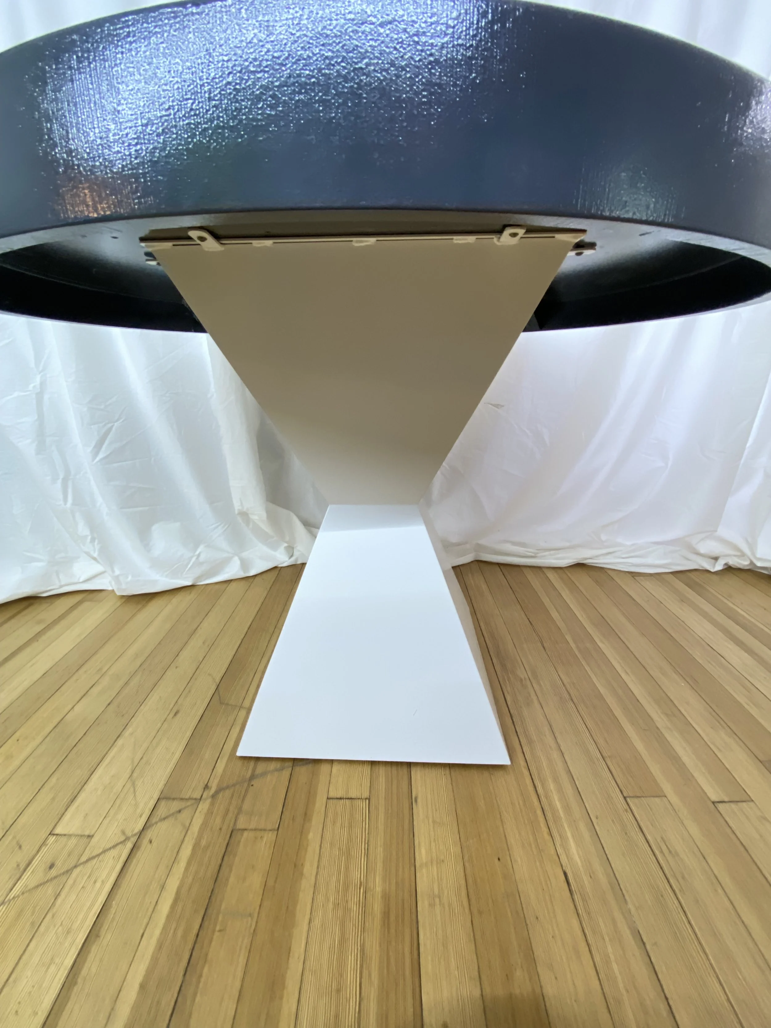 navy-blue-oval-dining-table-white-base.jpg